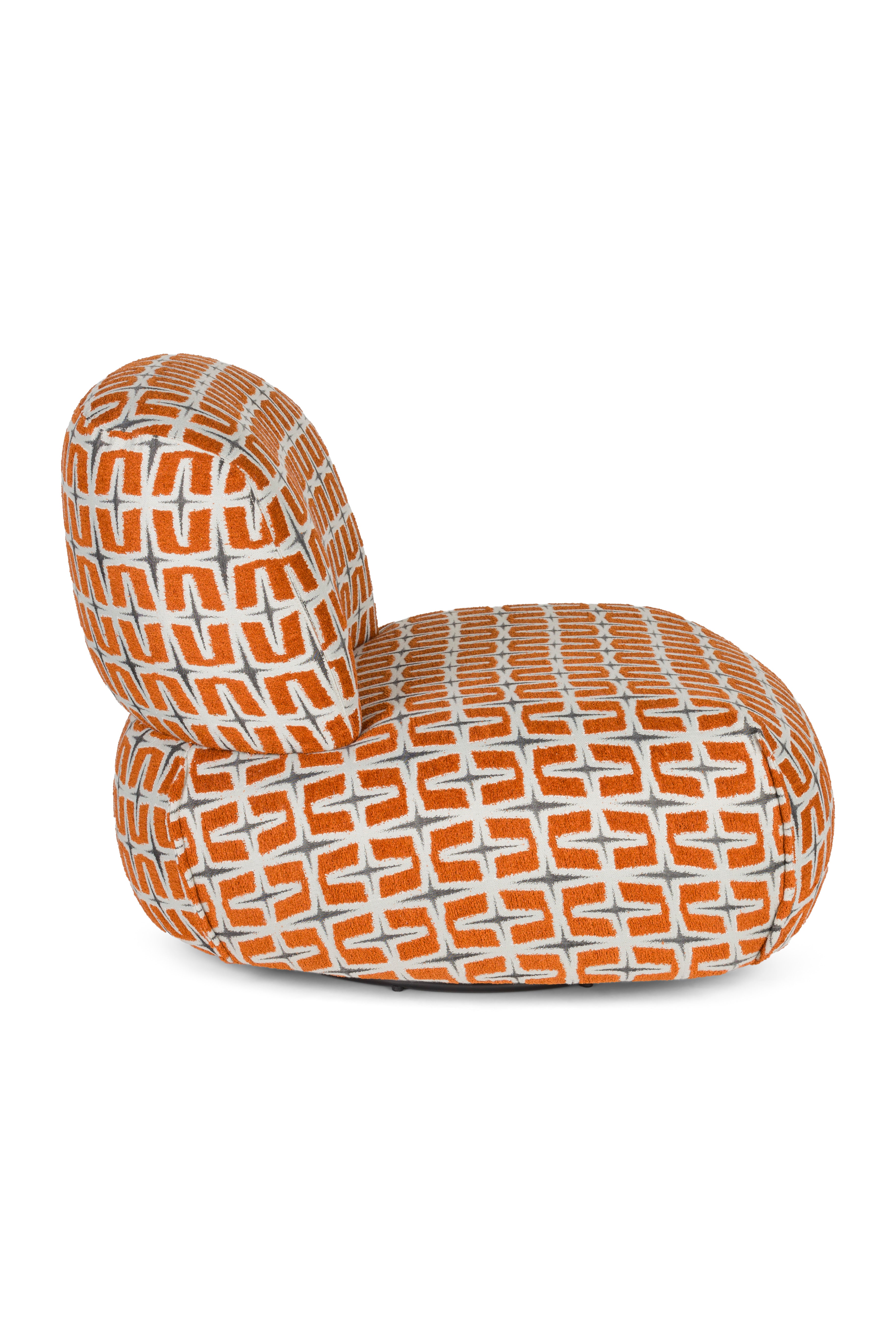 RITZ armchair in orange with geometric pattern
