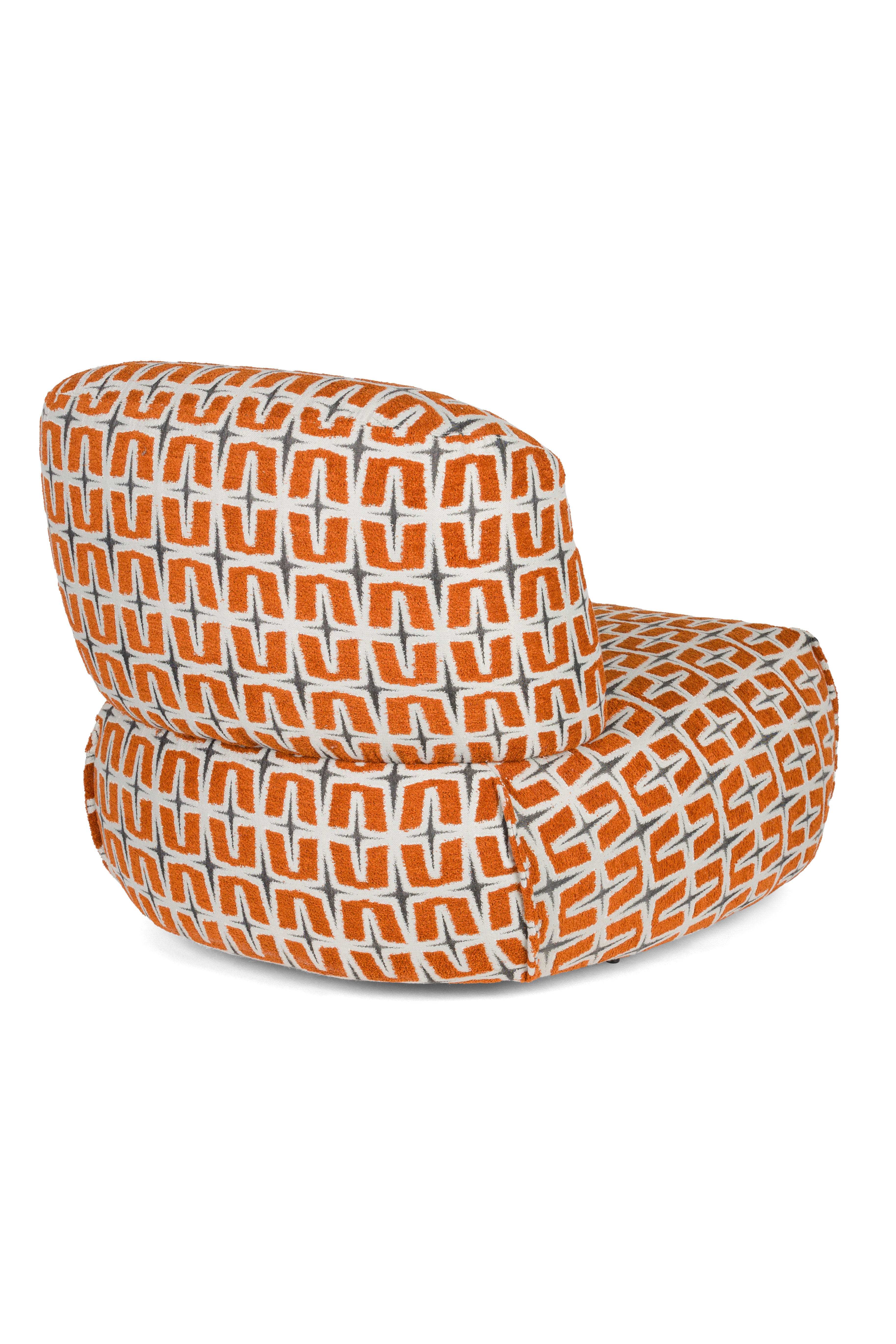 RITZ armchair in orange with geometric pattern