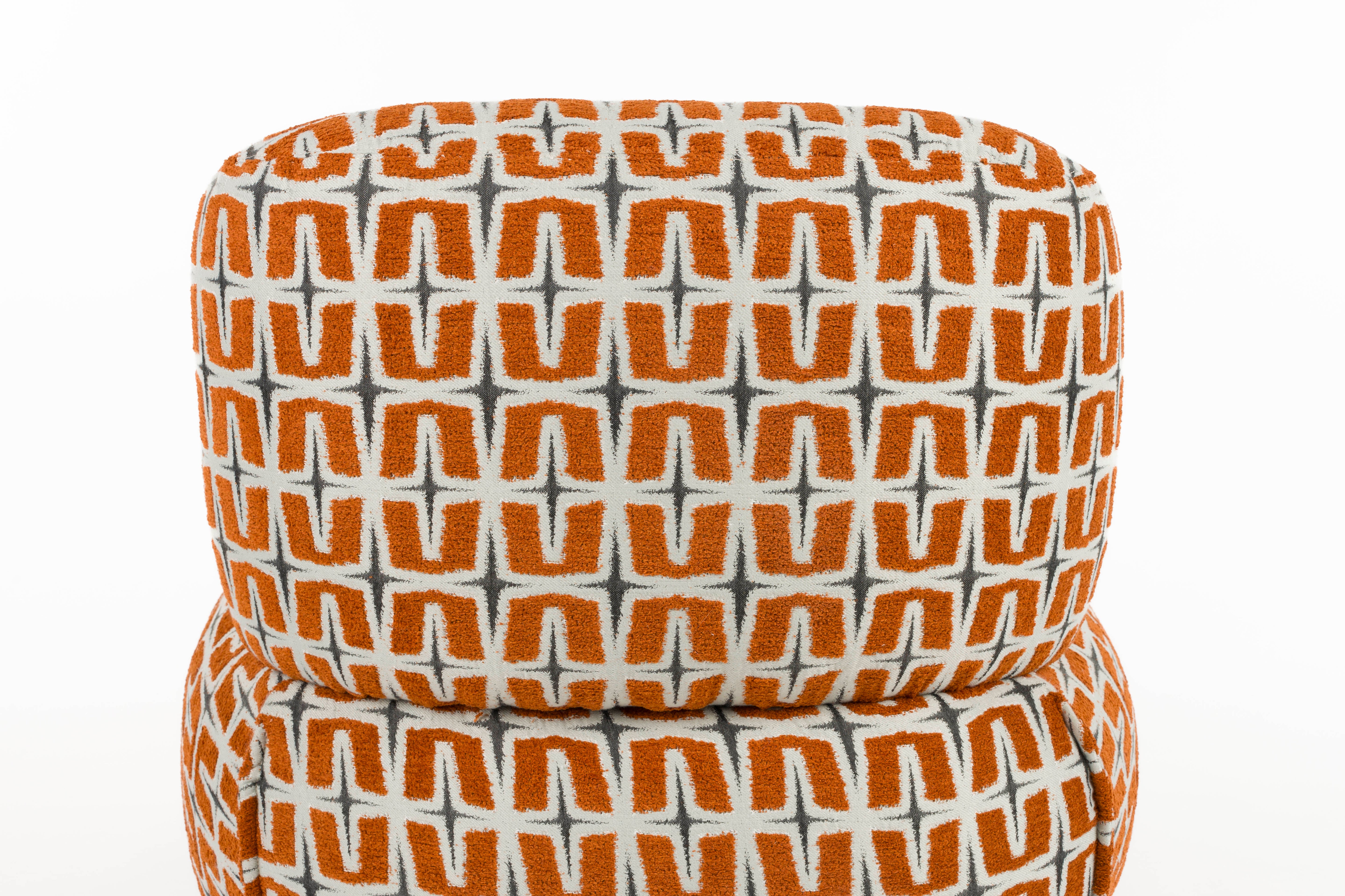 RITZ armchair in orange with geometric pattern