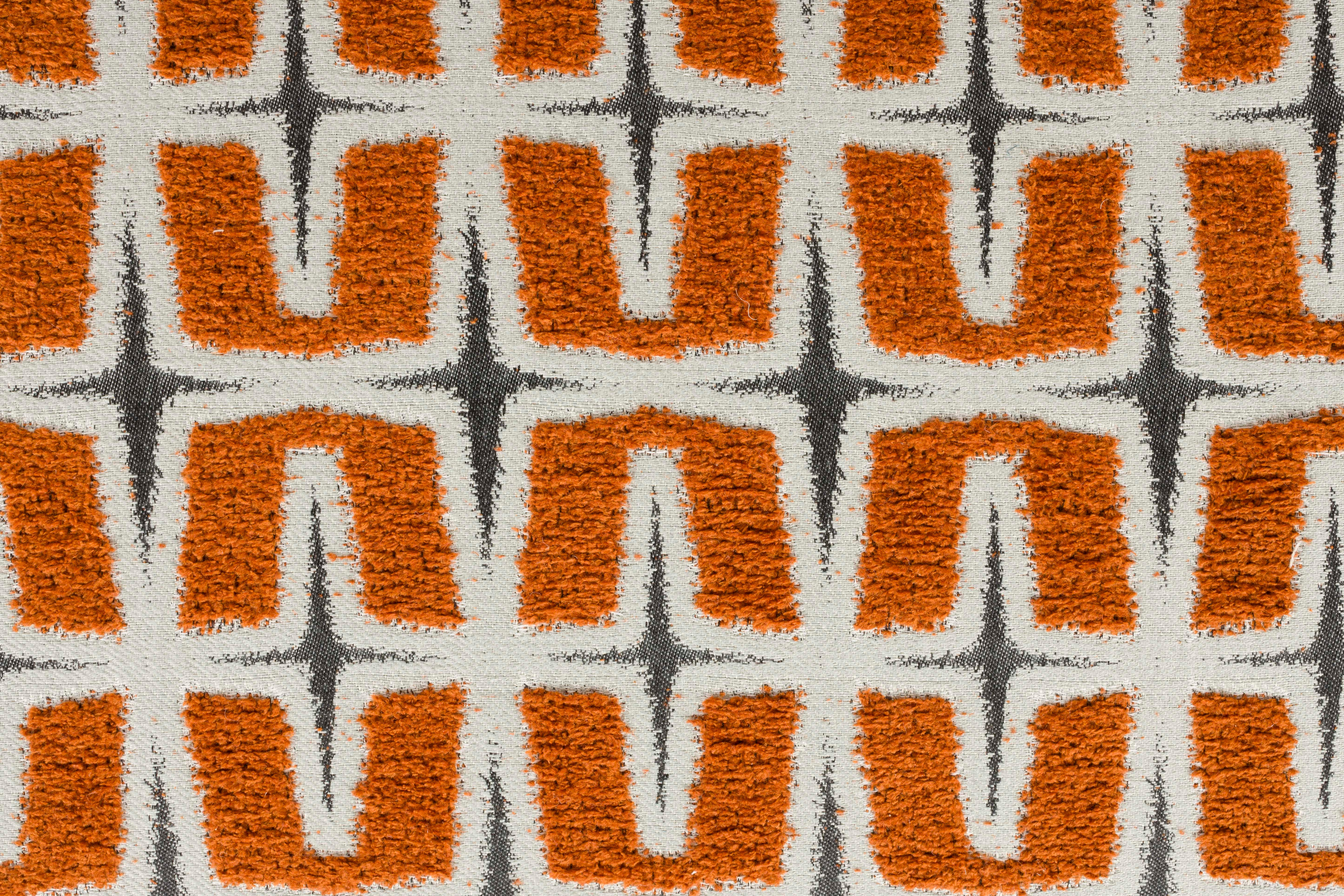 RITZ armchair in orange with geometric pattern