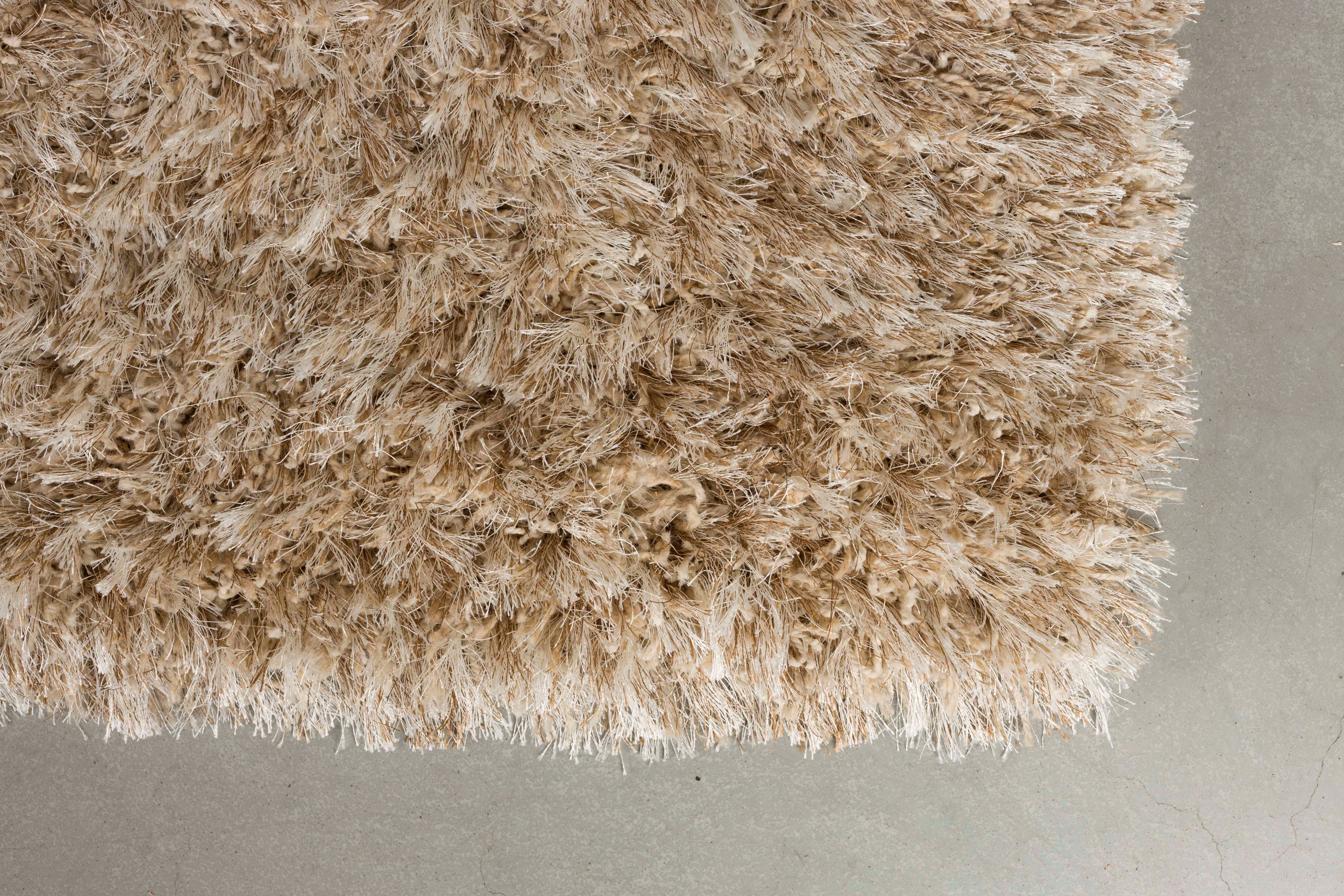 HAIRY dark beige rug with long pile