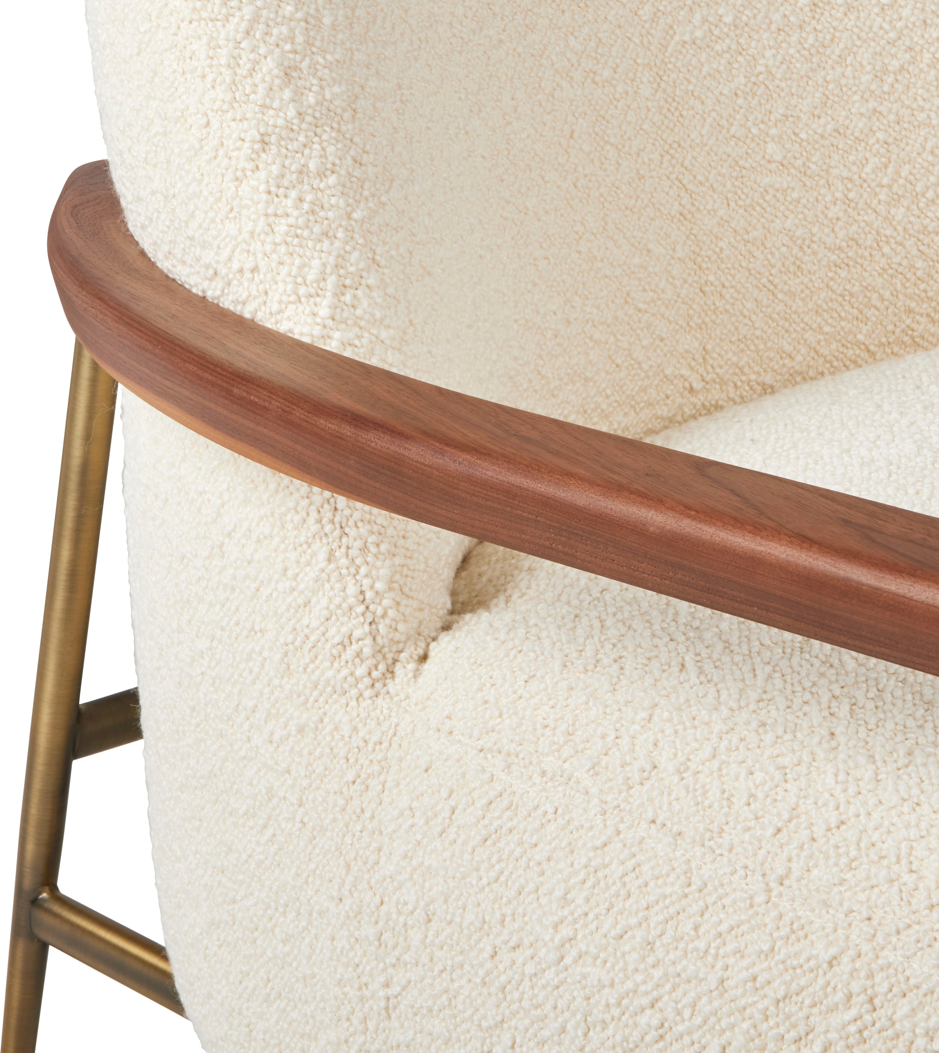 SEJOUR upholstered armchair with a brass base