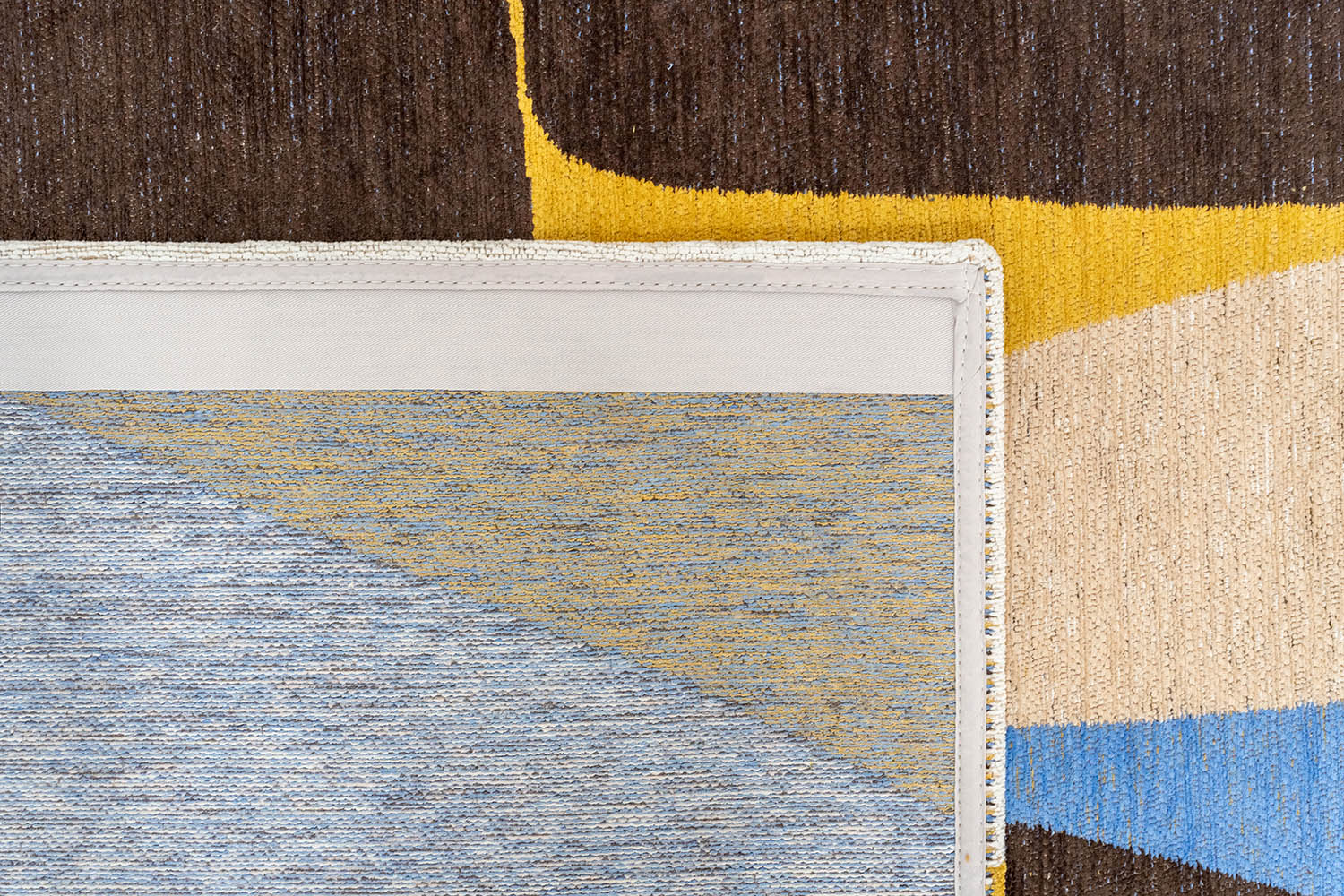 Vloerkleed STONES wit met bruin en blauw