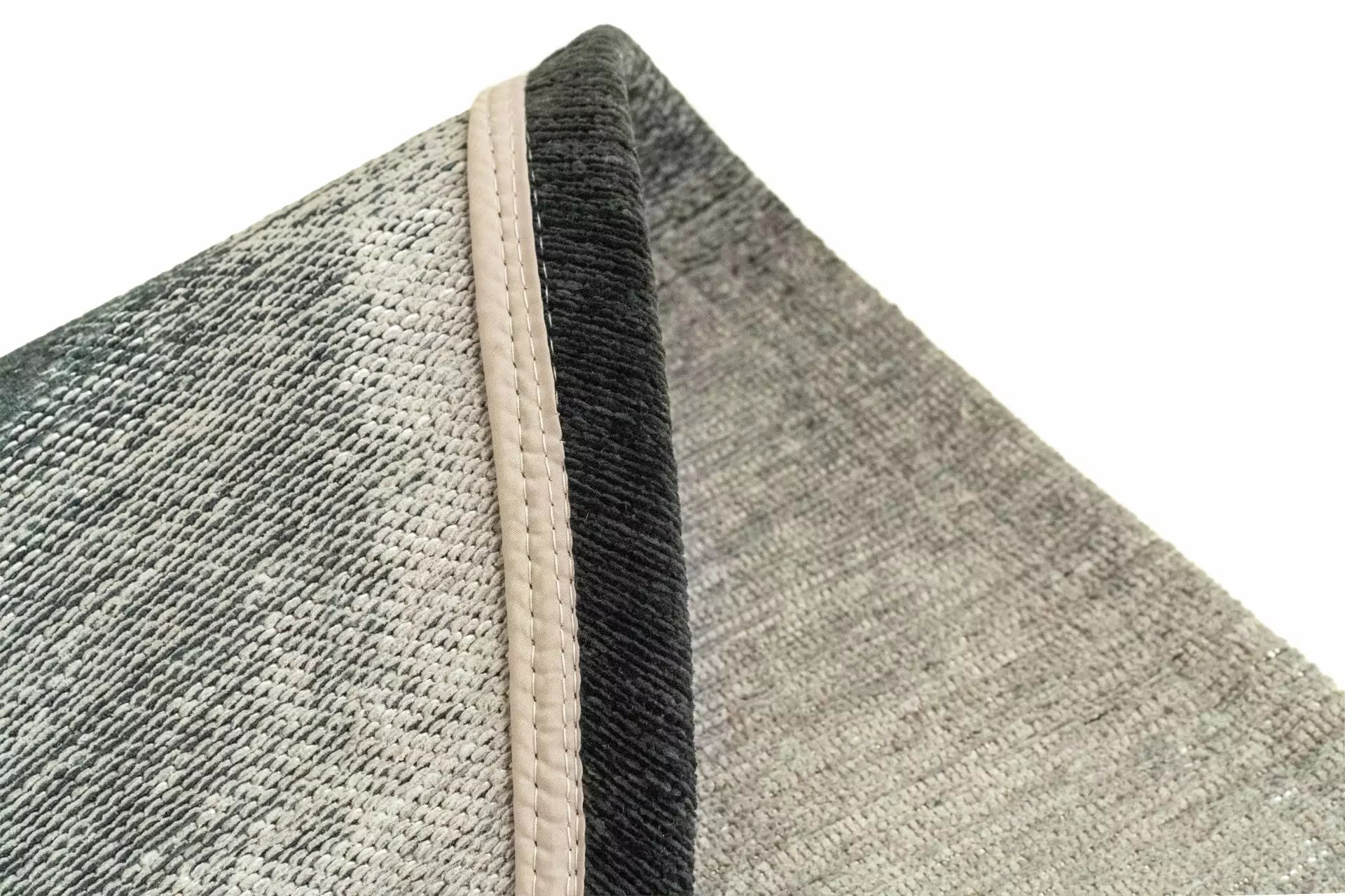 Ovale tapijt AQUARELLE LEAF zwart met beige