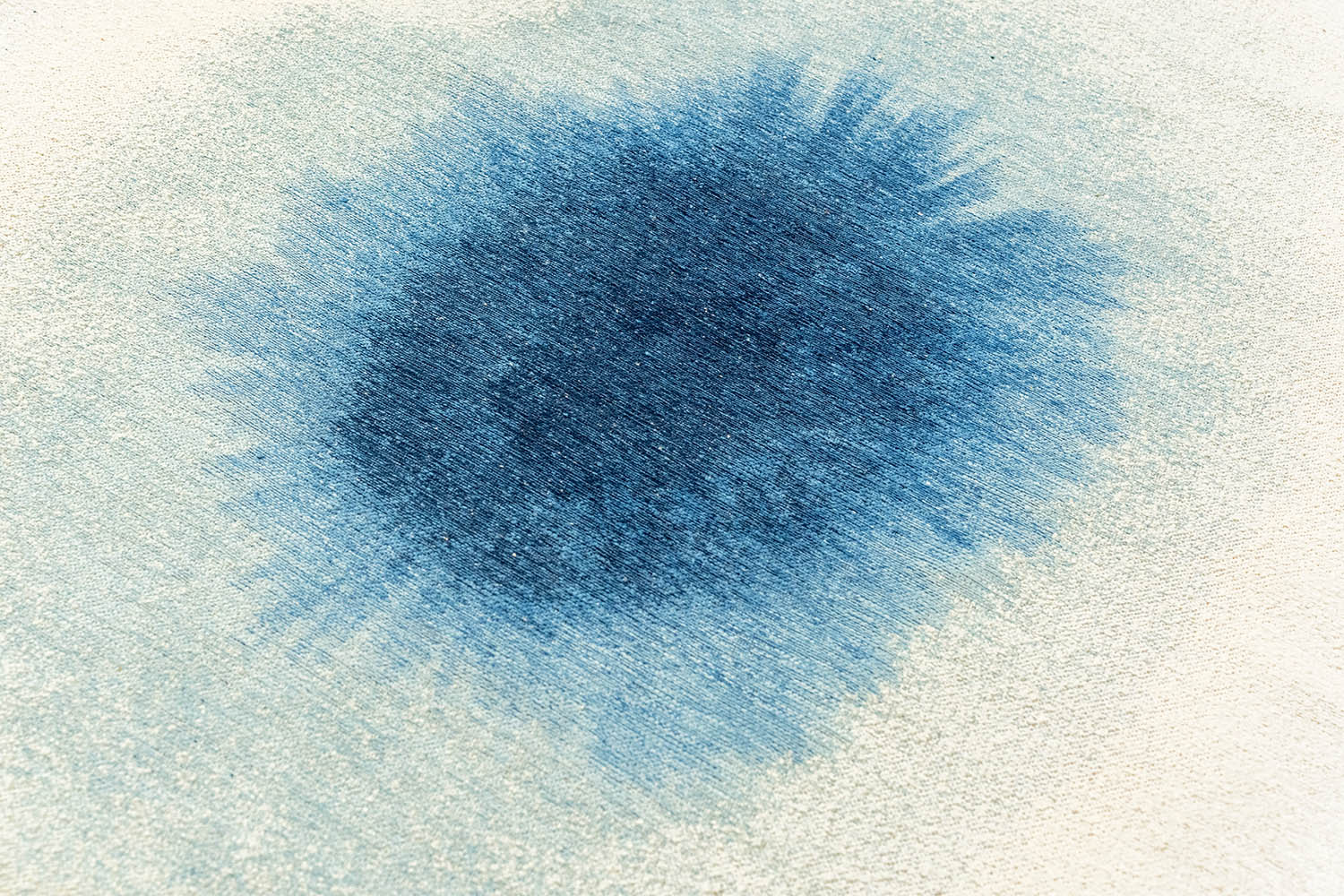 Ronde tapijt DROP wit met blauw
