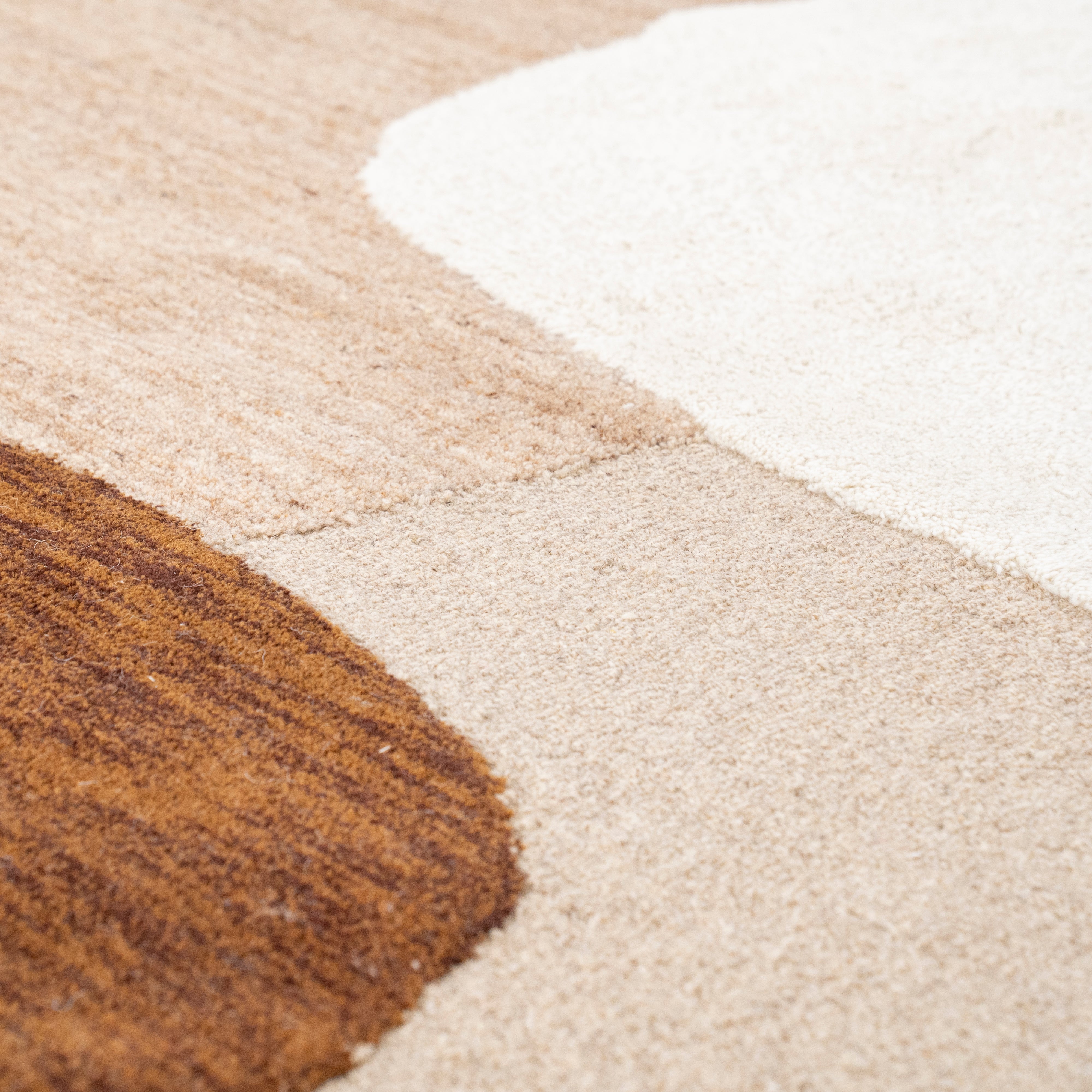 Ovale tapijt OGANI beige met bruin