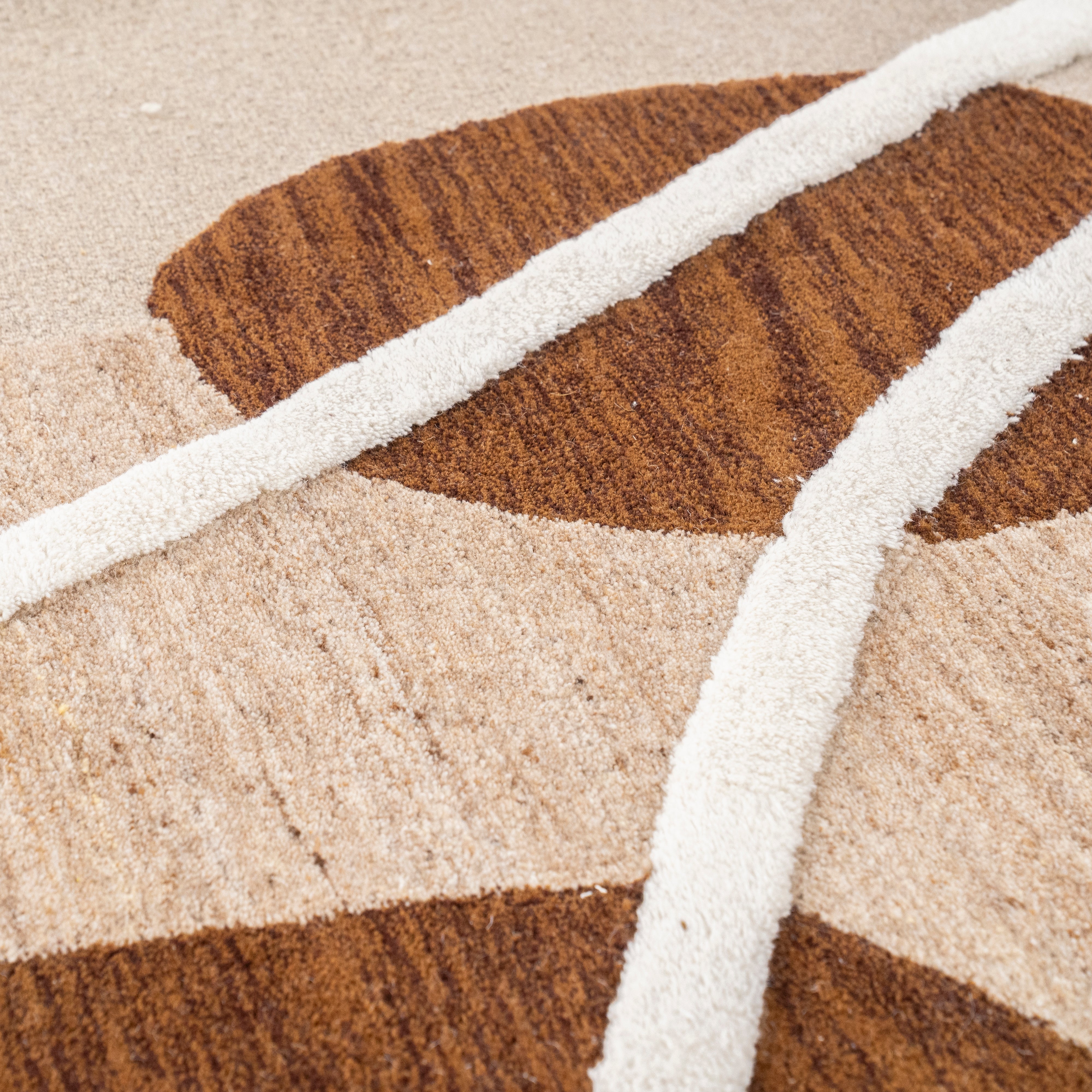 Ovale tapijt OGANI beige met bruin