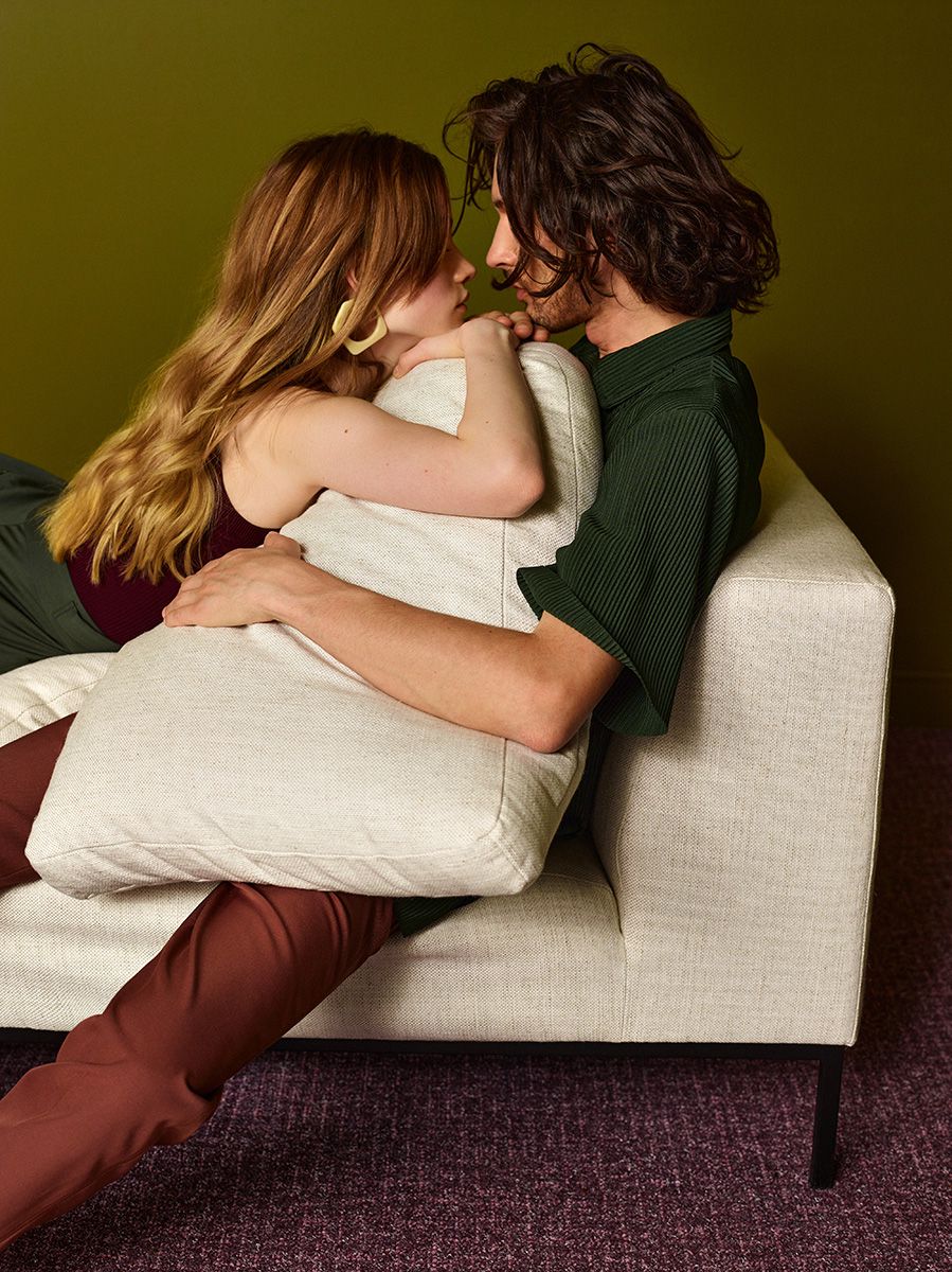 Open left-sided modular sofa HOLDEN upholstered with a black base