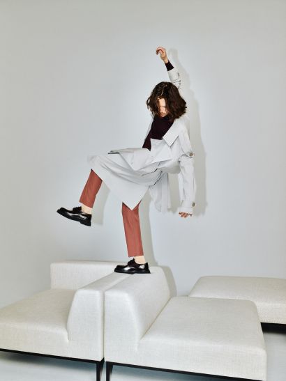 Open left-sided modular sofa HOLDEN upholstered with a black base