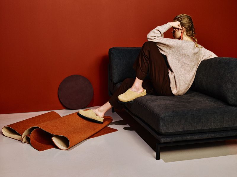 Left-facing 4-seater sofa BRIXTON upholstered with a black base