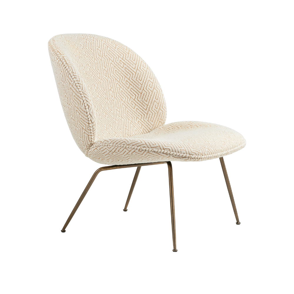 Fauteuil BEETLE gestoffeerd met een messing basis