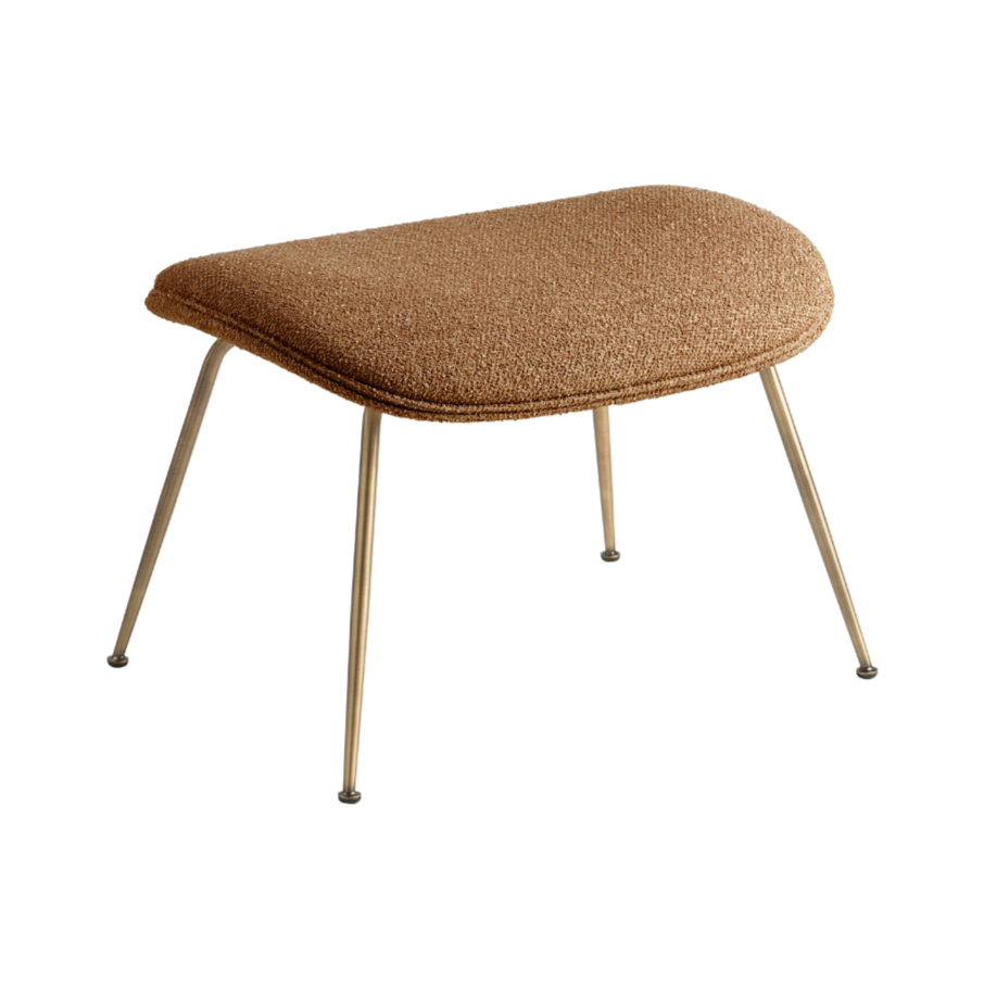 Puf BEETLE gestoffeerd met een messing basis