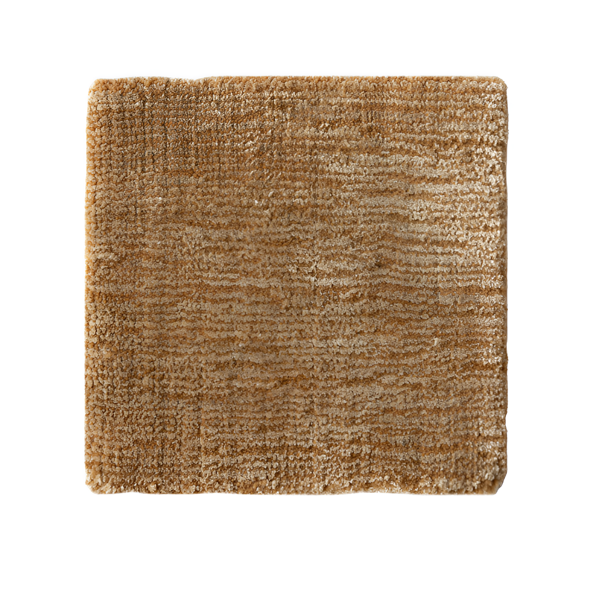 GUBI karamelkleurig tapijt met lange haren