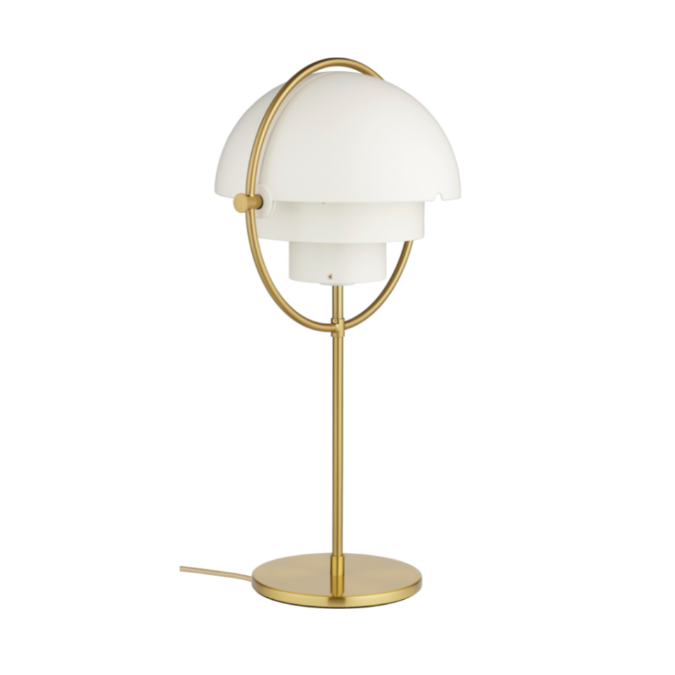 MULTI-LITE table lamp with a brass base and white shade