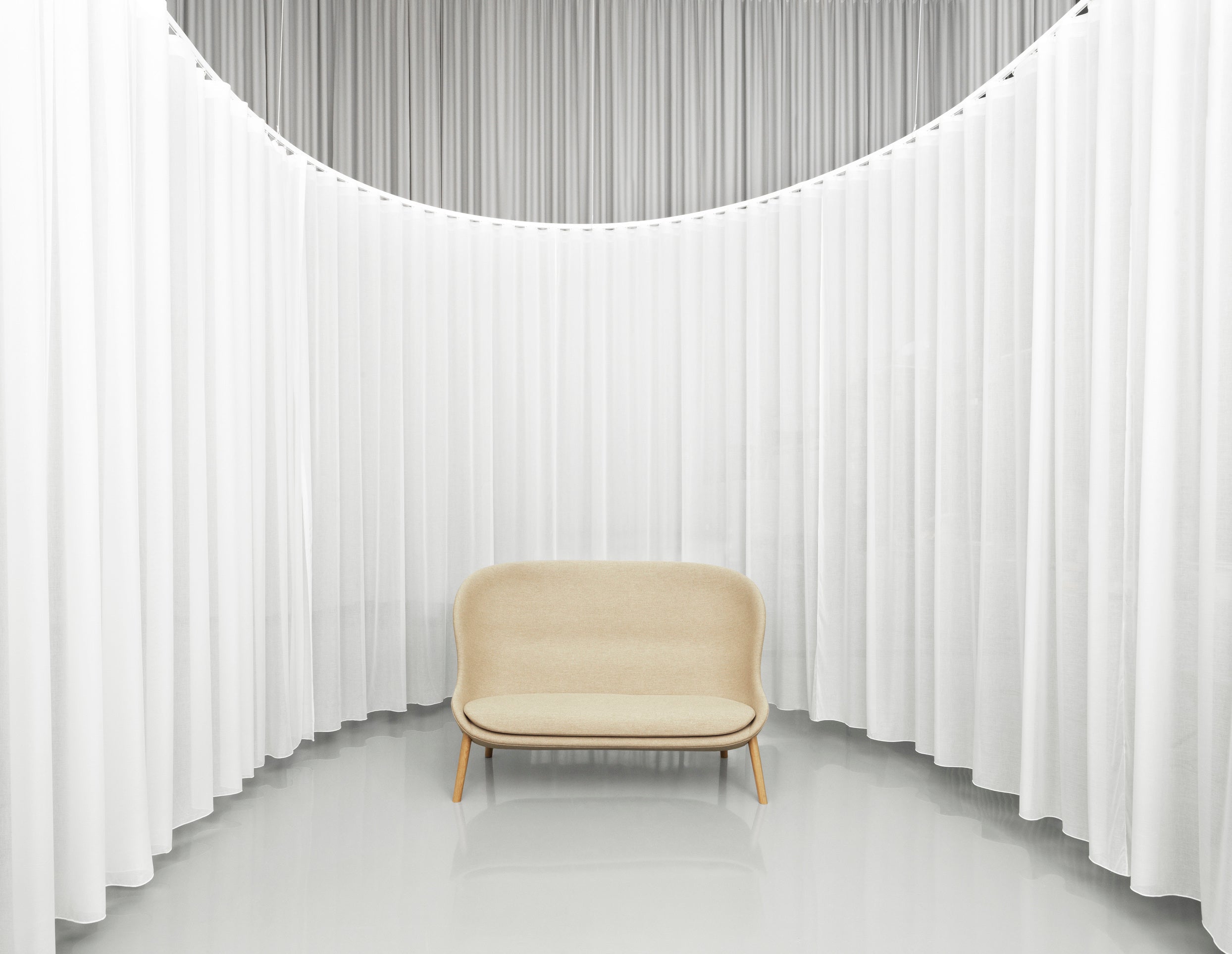 Hyg Upholstered sofa with a black oak base