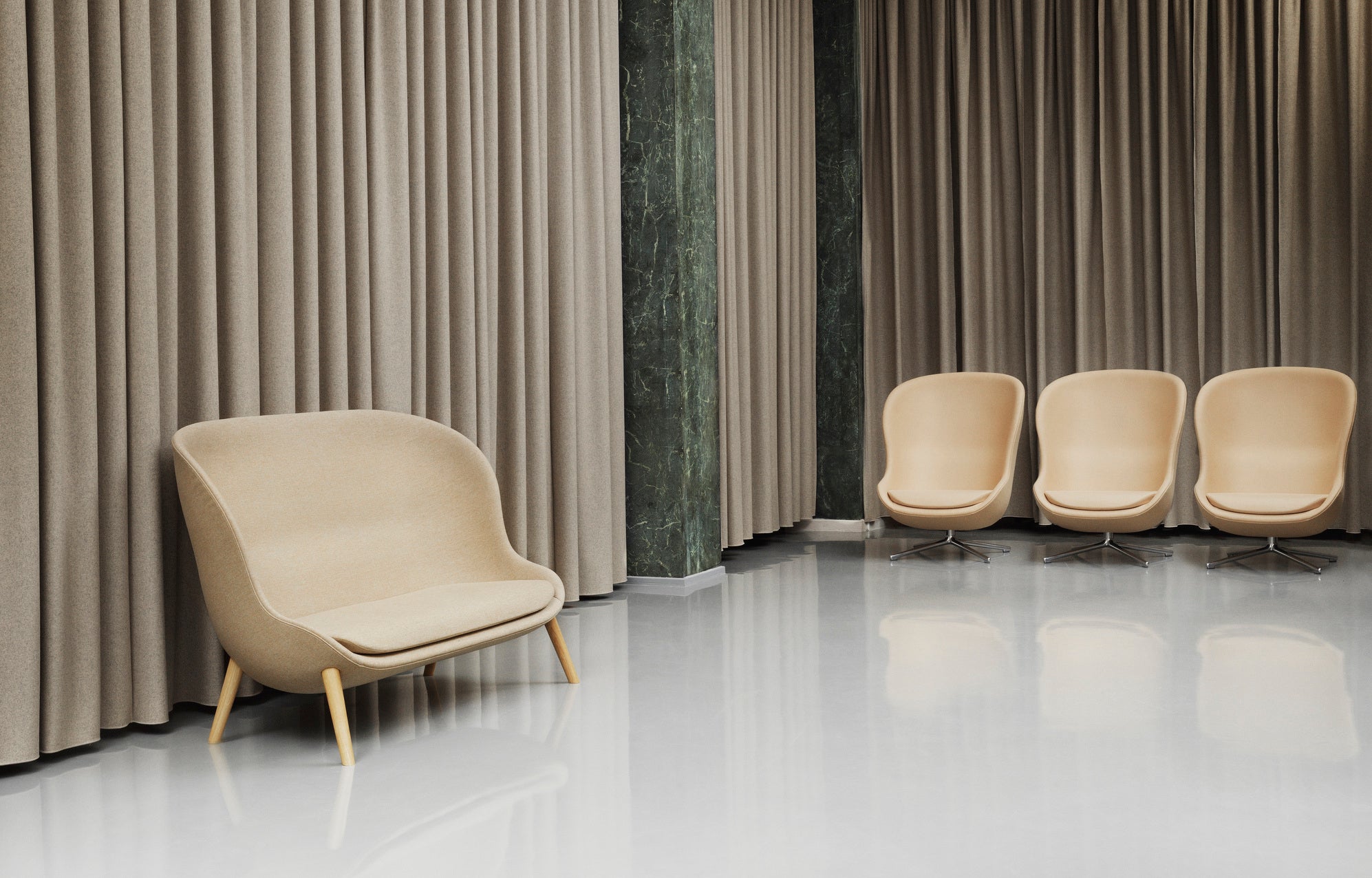 Hyg Upholstered sofa with a black oak base