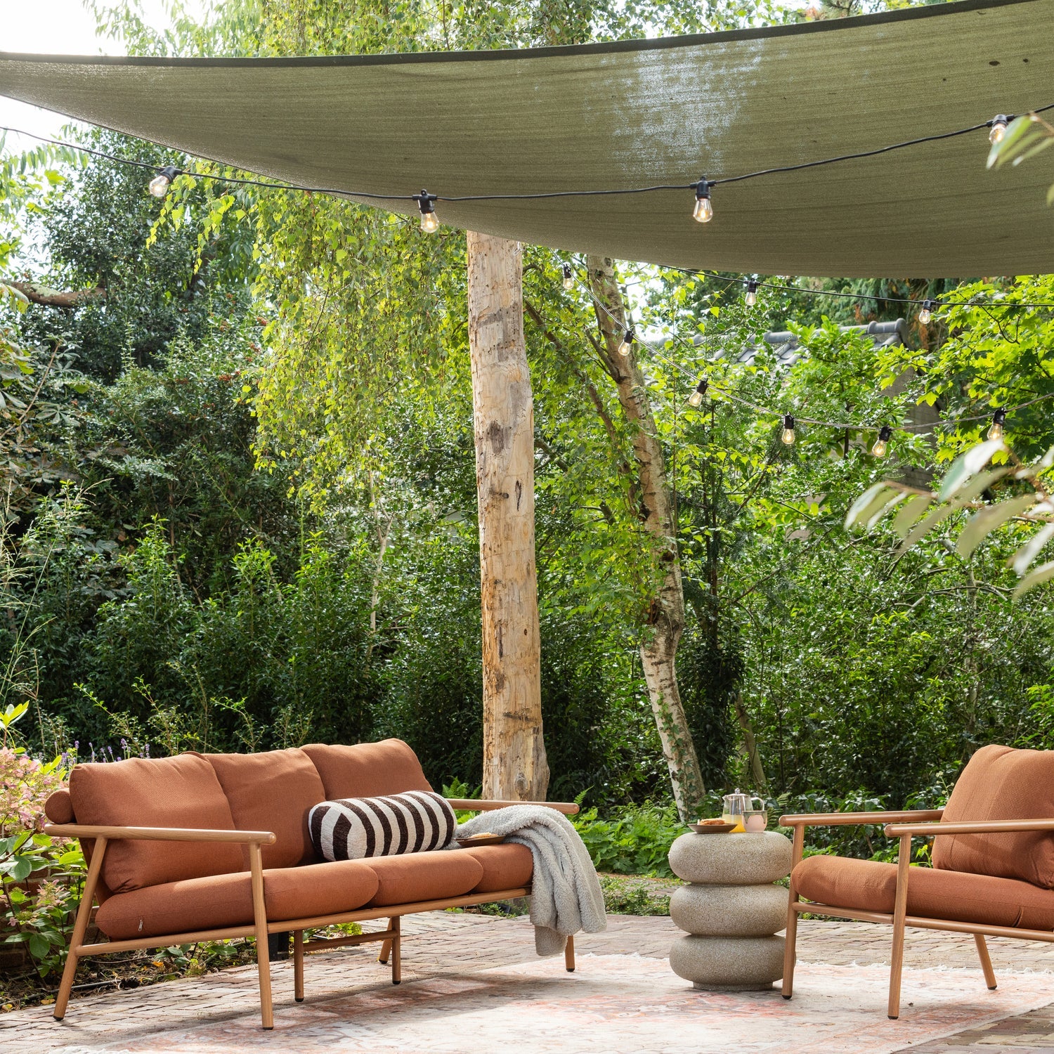 Symmetrische tuinhoekbank CAVERO baksteen