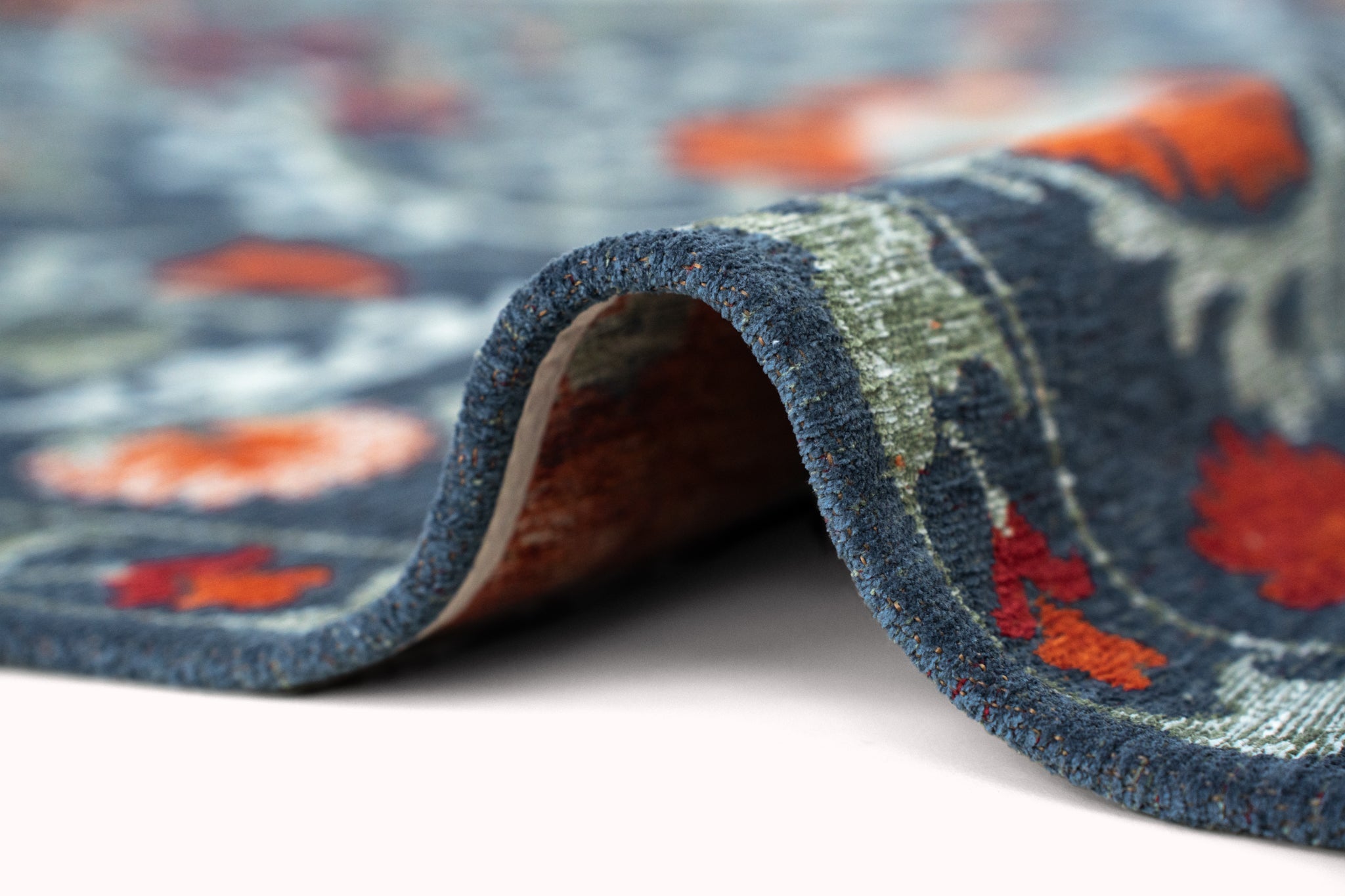 SUZANI NORDIC rug in blue with gray and orange