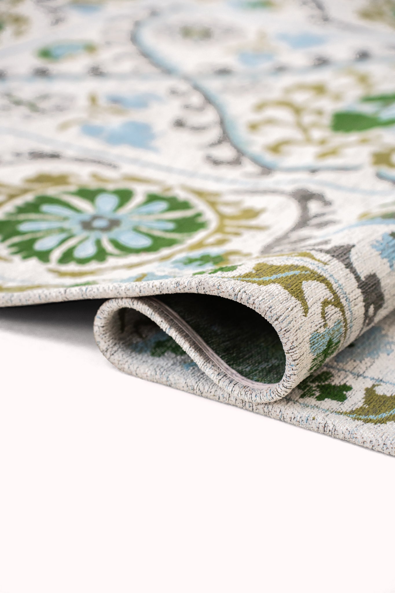 Vloerkleed SUZANI SLAVIA gebroken wit met groen en blauw