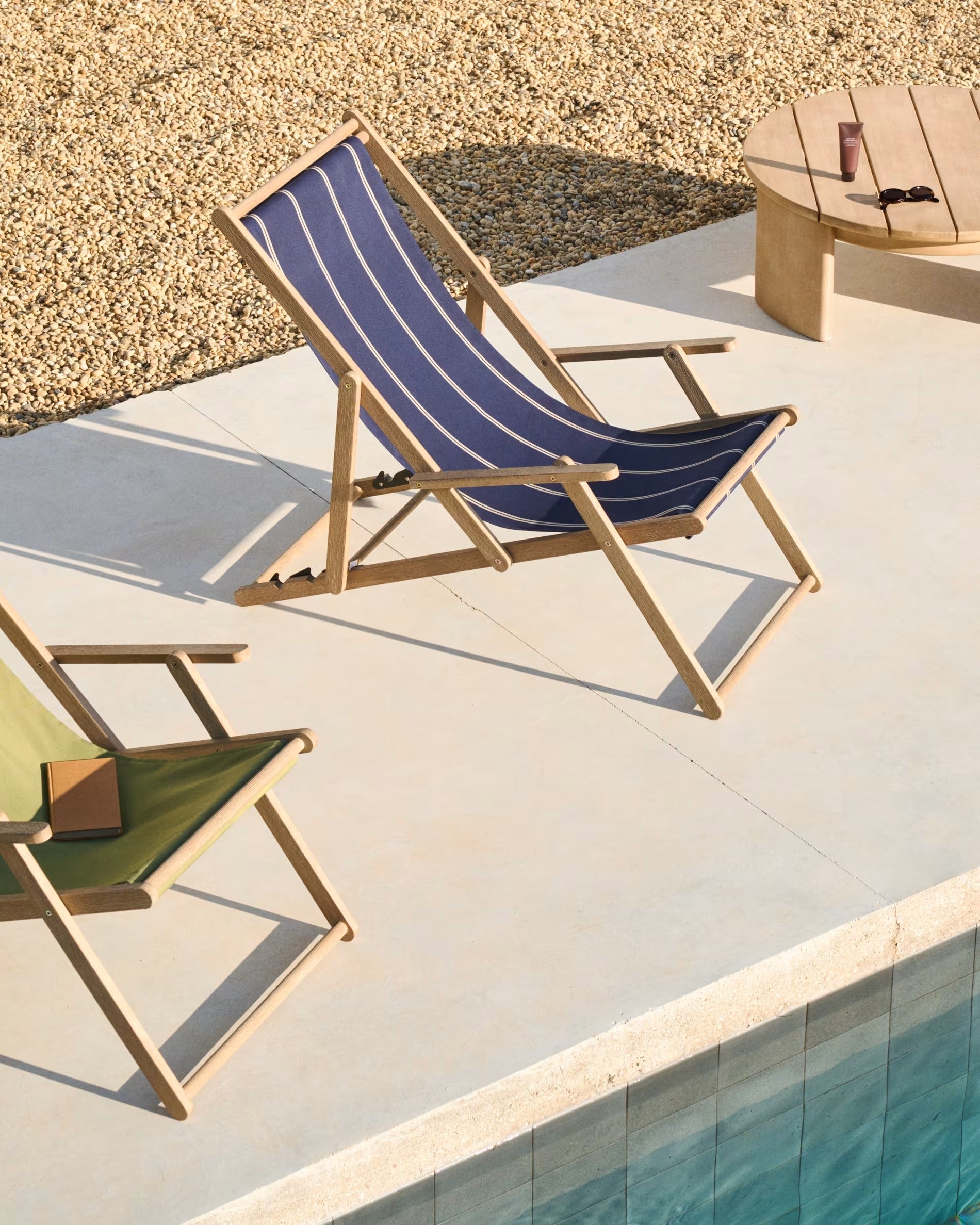 A navy-beige Vilara deckchair with an acacia base