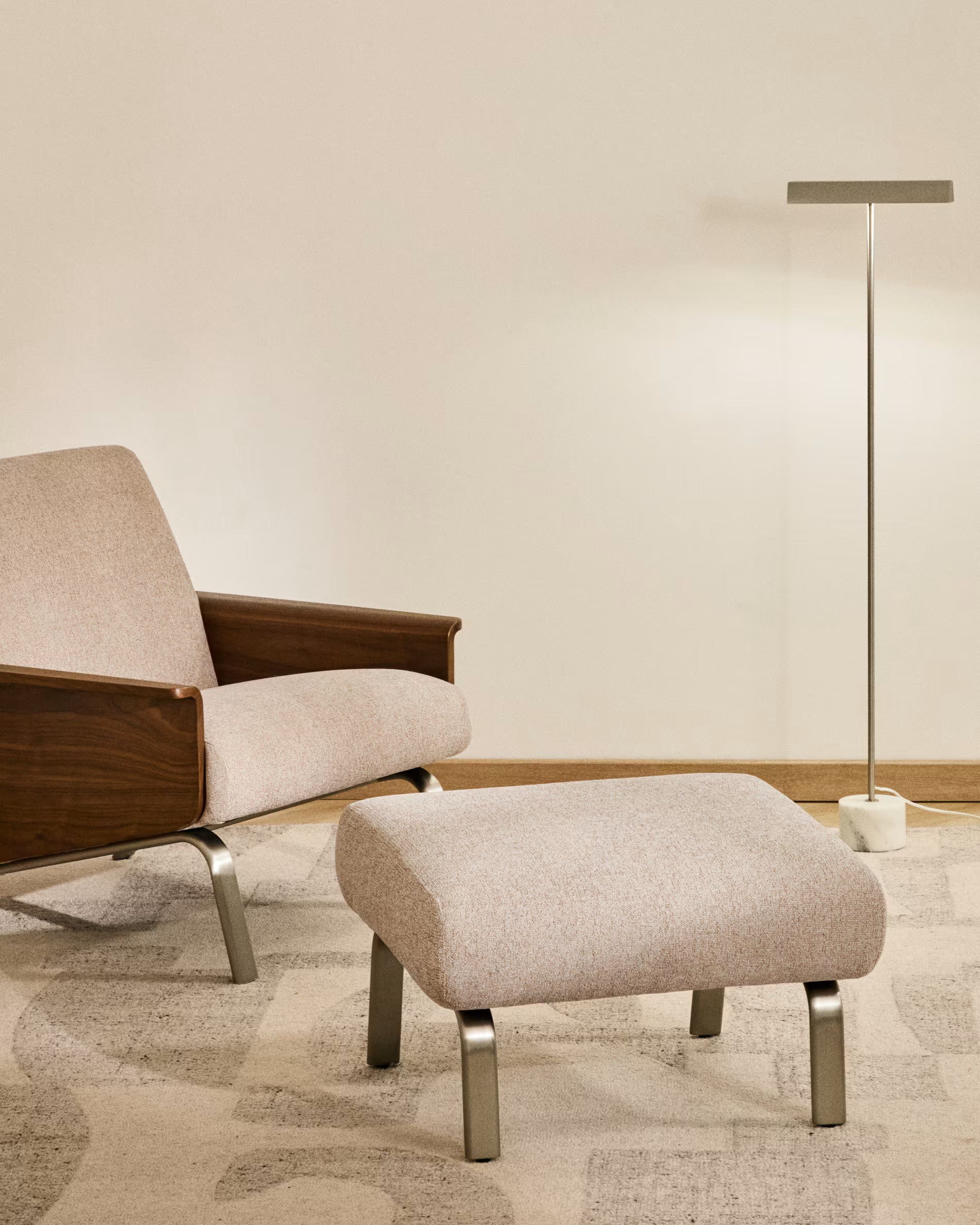 AMSEN footstool in light brown with a steel base