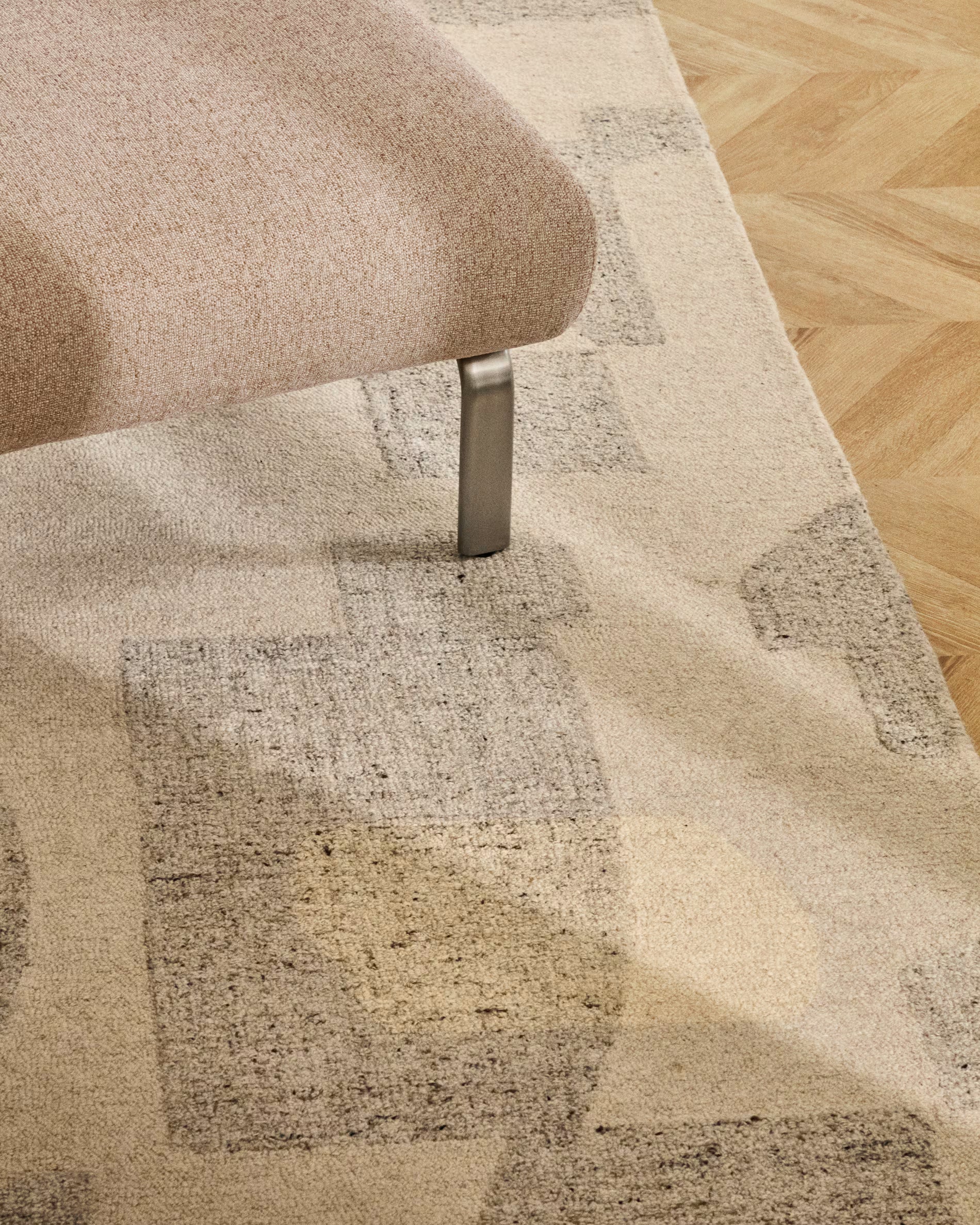 AMSEN footstool in light brown with a steel base