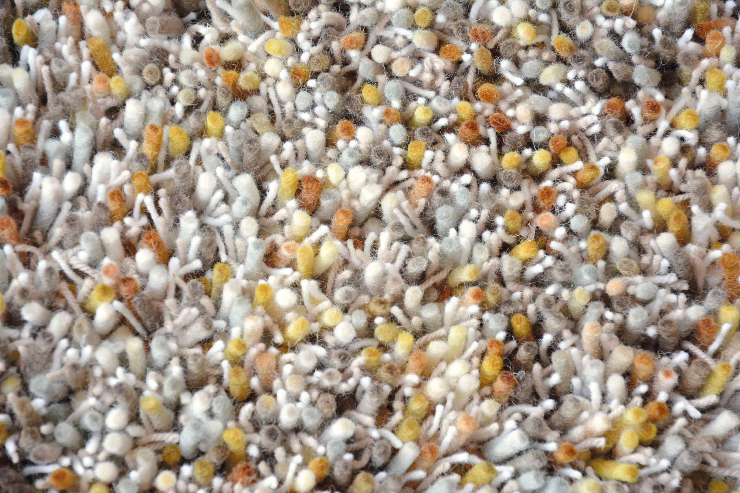 Vloerkleed YOUNG crème-oranje met lange haren