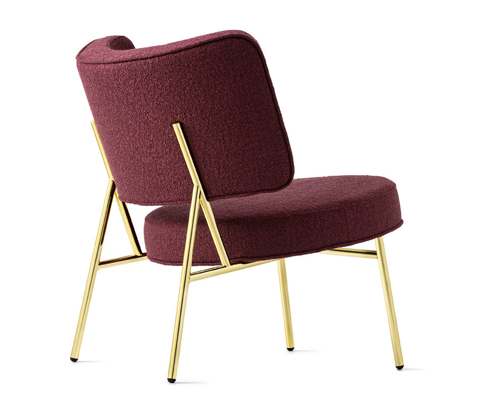 Upholstered COCO armchair with a golden base