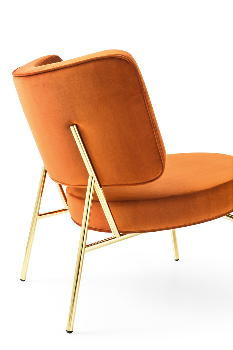 Upholstered COCO armchair with a golden base