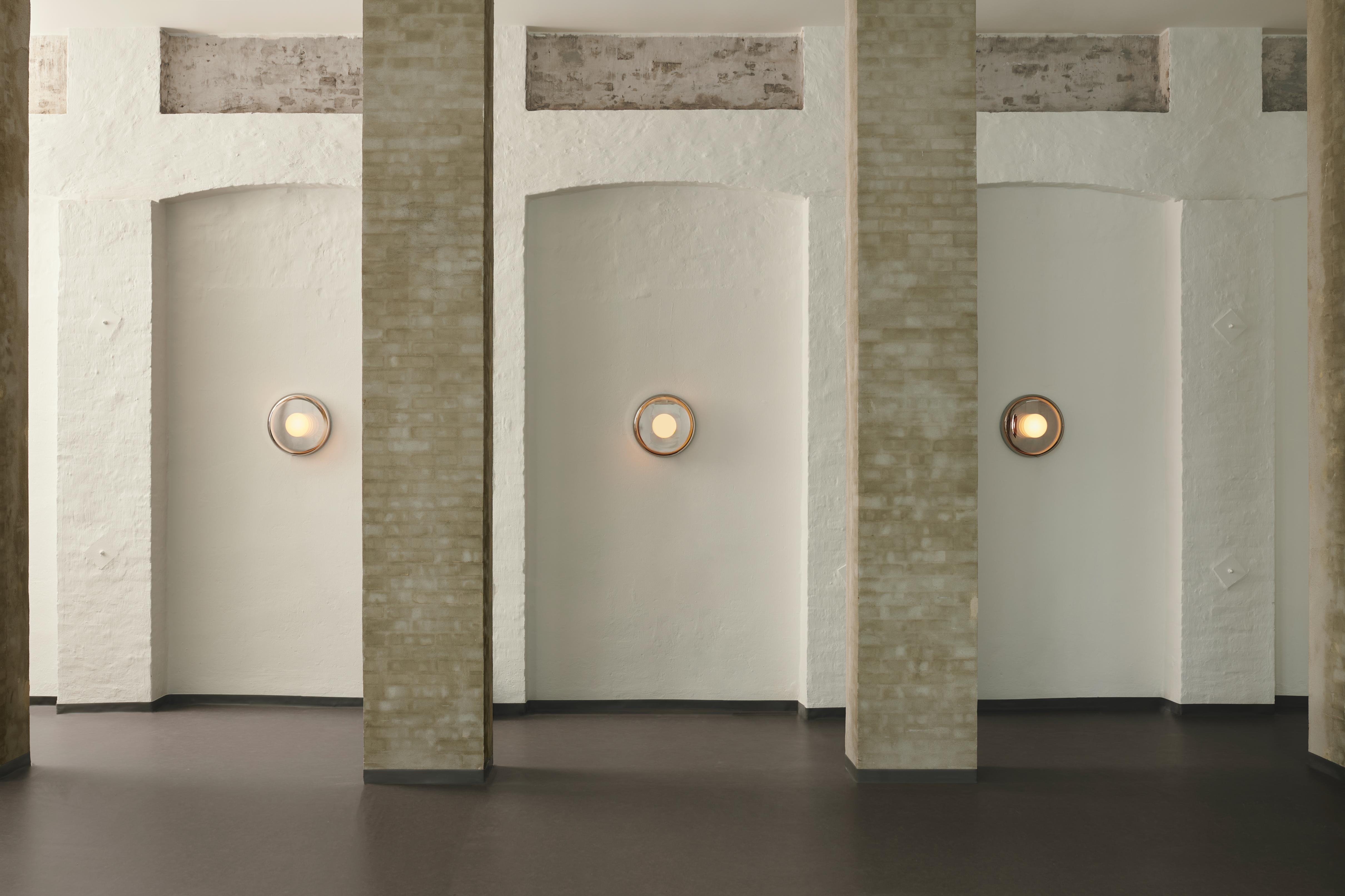 ENDLESS wall lamp coated glass