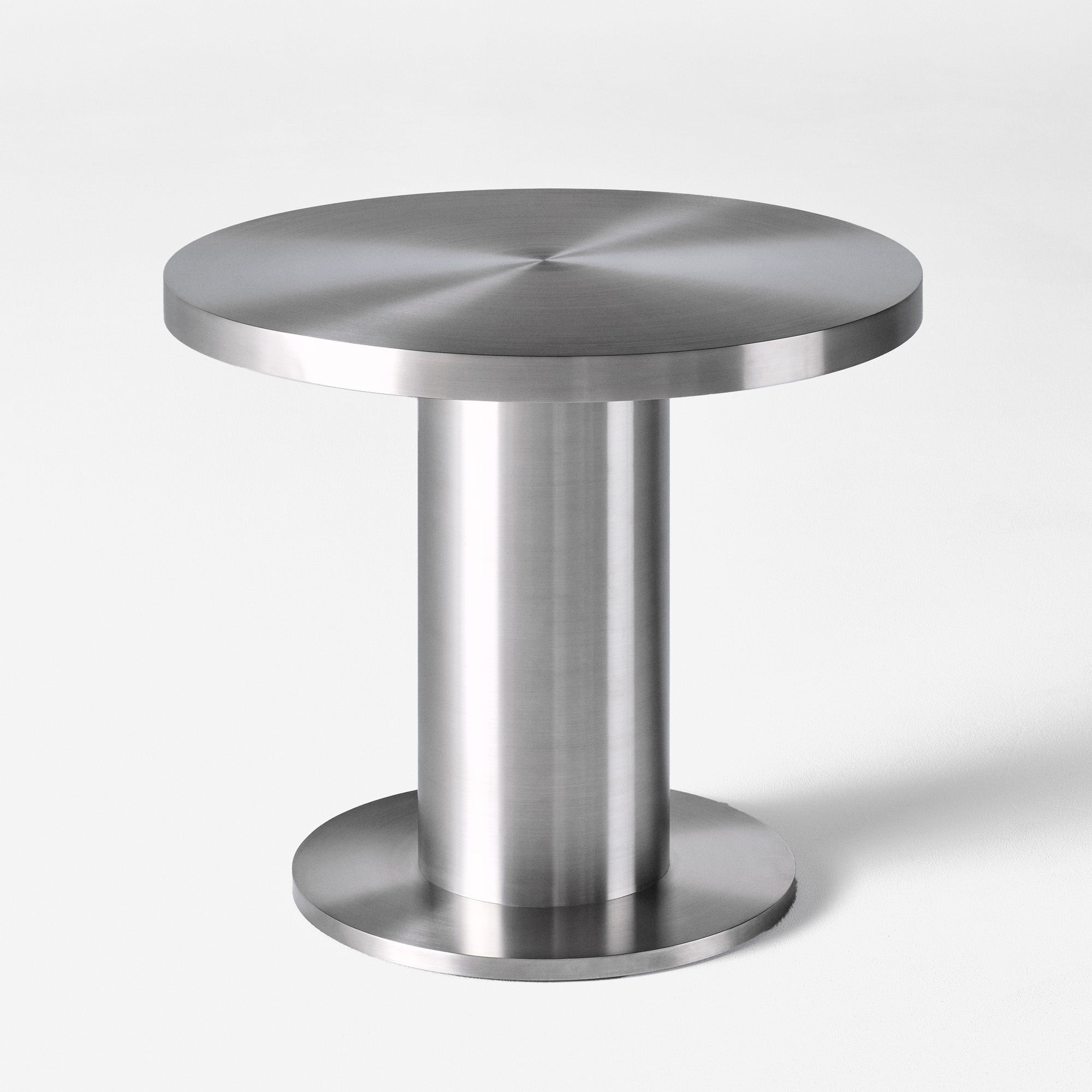 Runder Tisch CUFFLINK poliertes Stahl