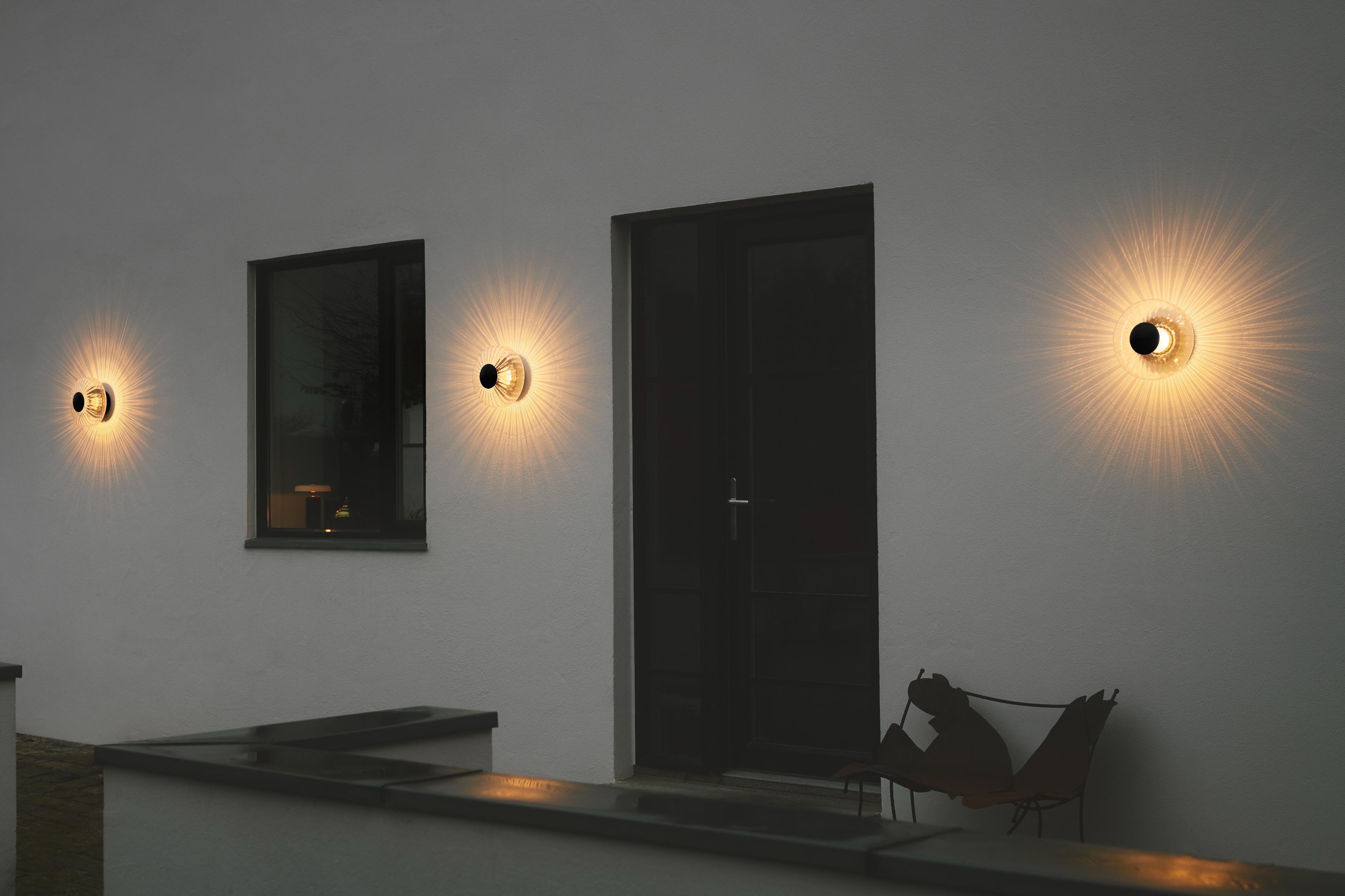 Buitenwandlamp NEW WAVE OPTIC transparant met zwarte afwerking