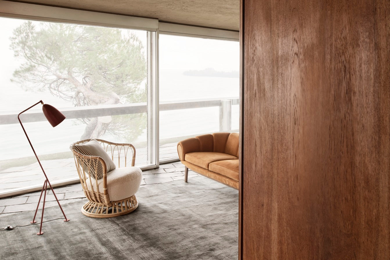 Fauteuil GRACE gestoffeerd met een rotan basis