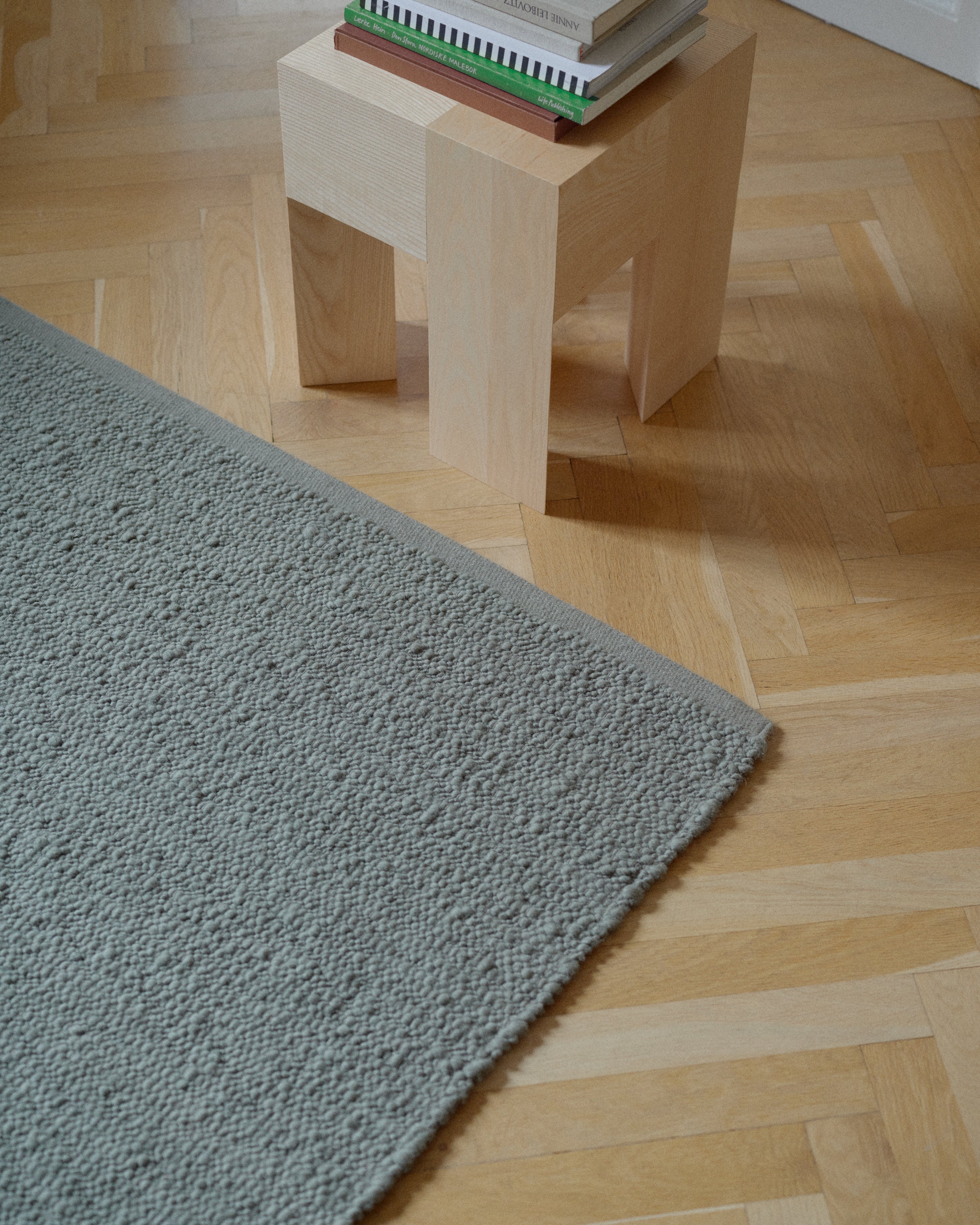 Teppich PEBBLED POEM grün Moos