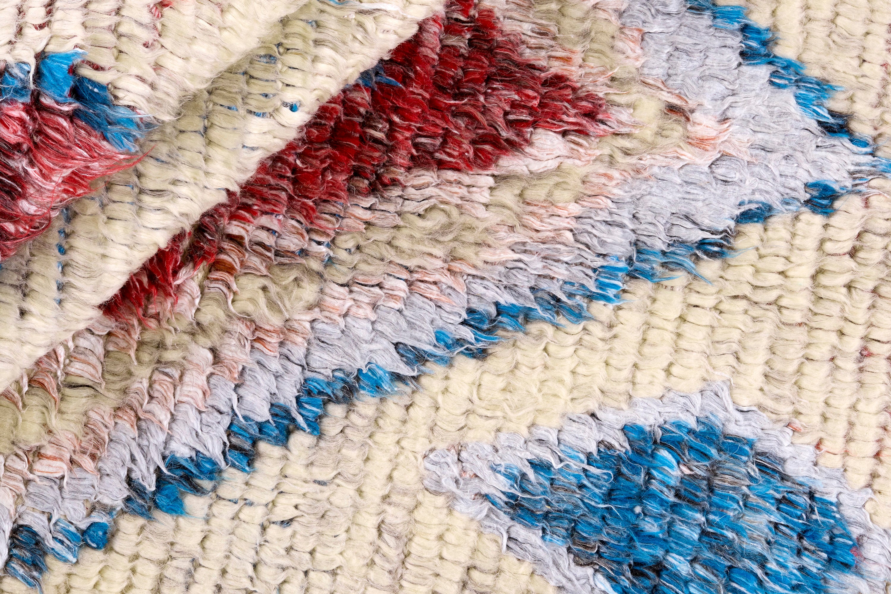 Vloerkleed TRIBE beige met rood en blauw