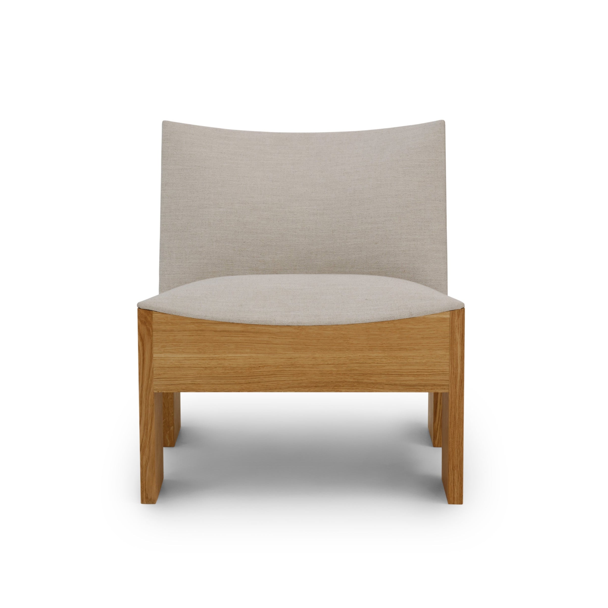 Tenon upholstered armchair with an oak base