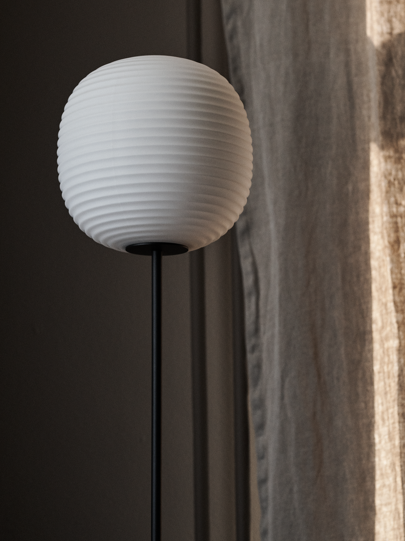 Lantern white floor lamp with a black base
