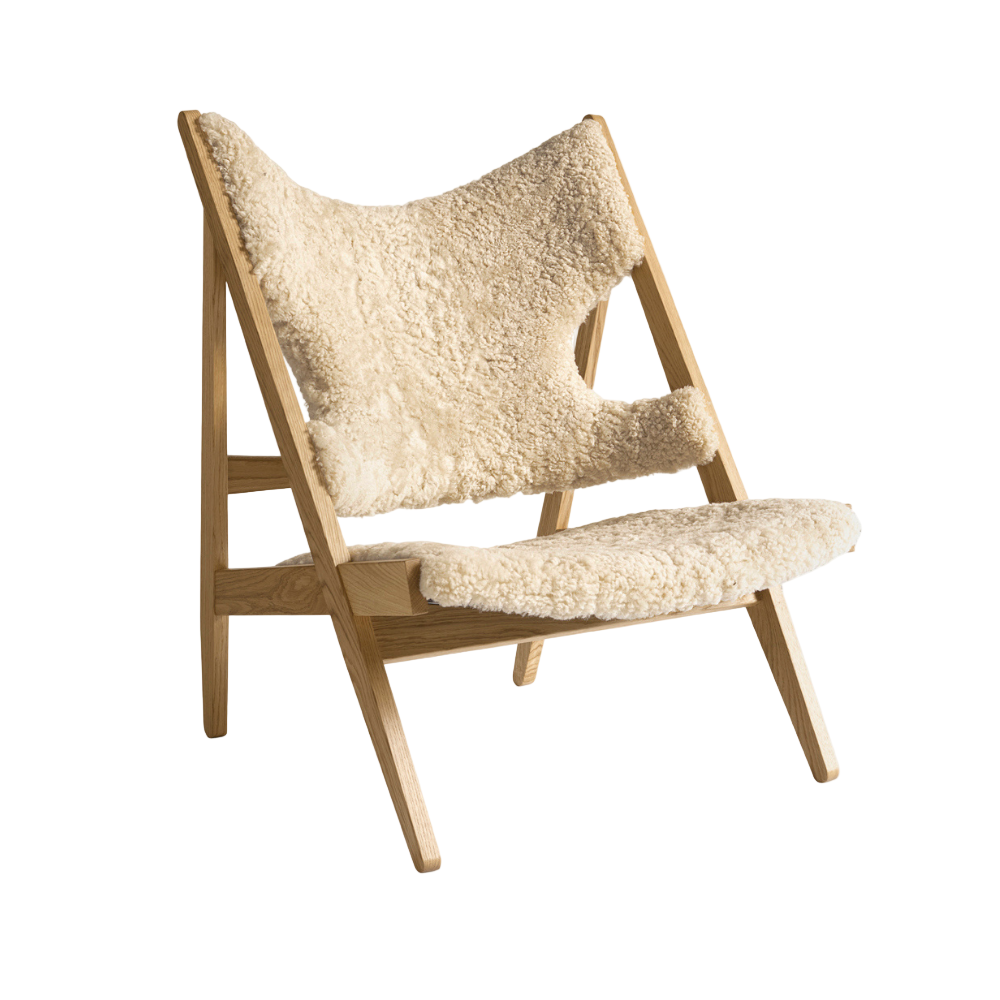 Fauteuil KNITTING schapenleer met eiken basis