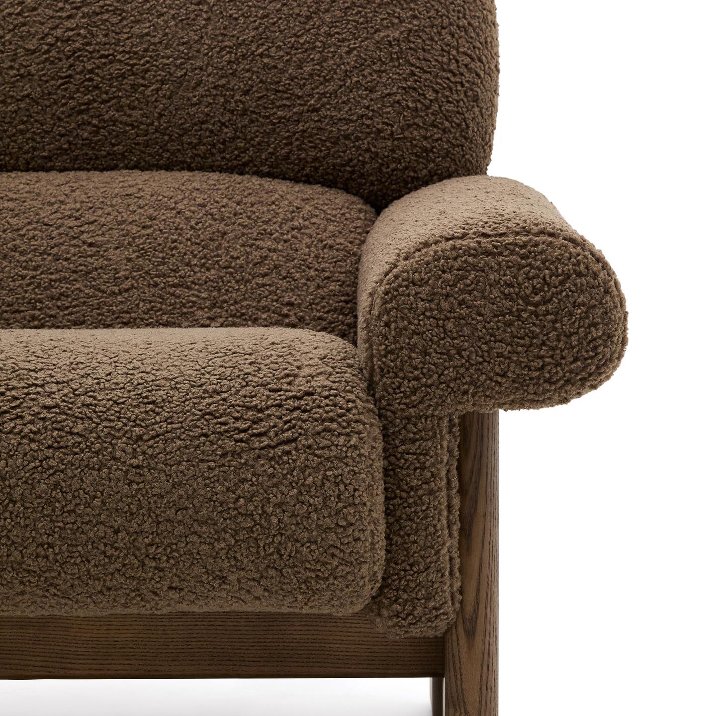 NEMA armchair in brown boucle with a dark ash base