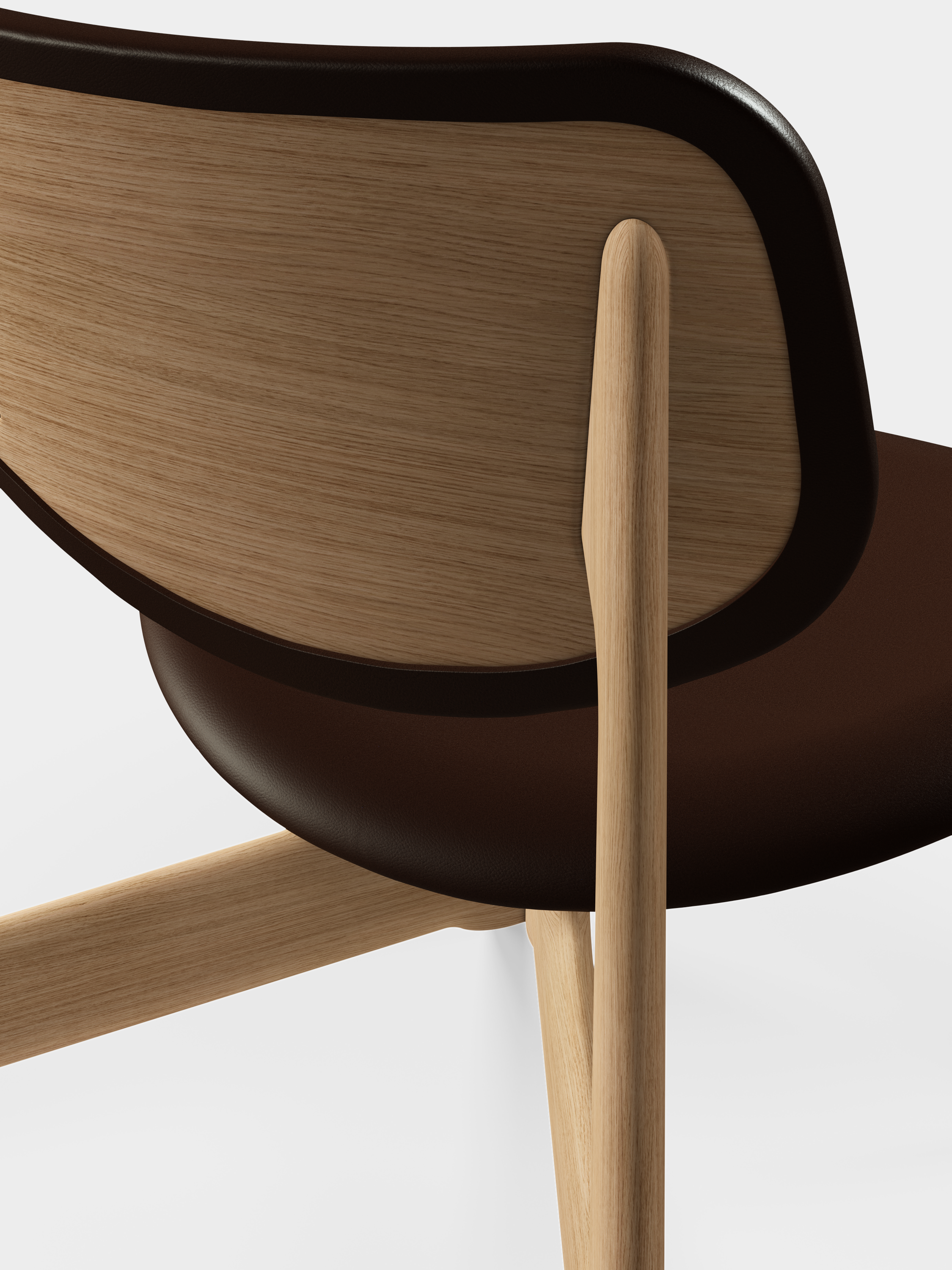 SLAB fauteuil in bruin leer met eiken basis