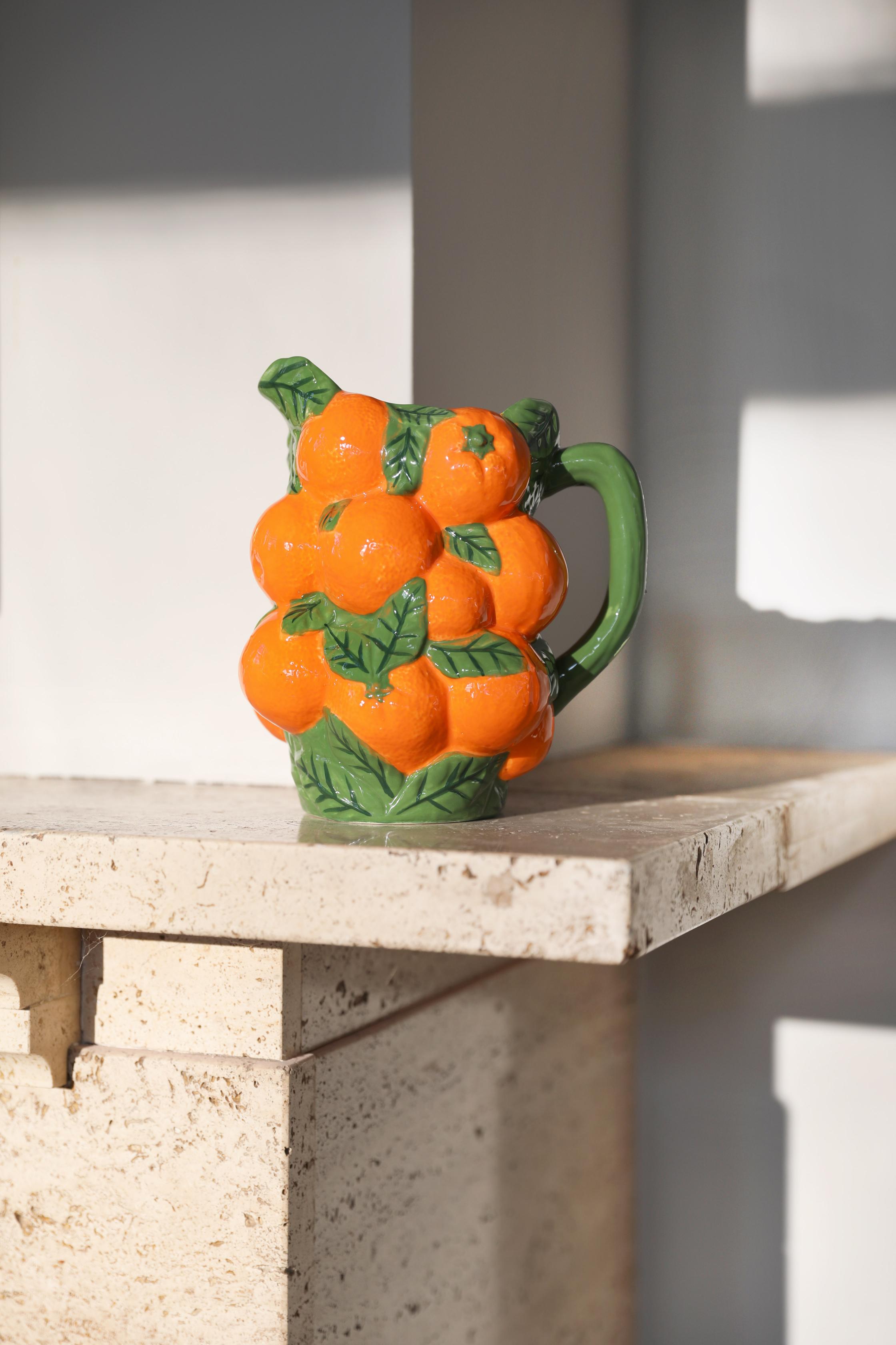 Oranje kan met groen