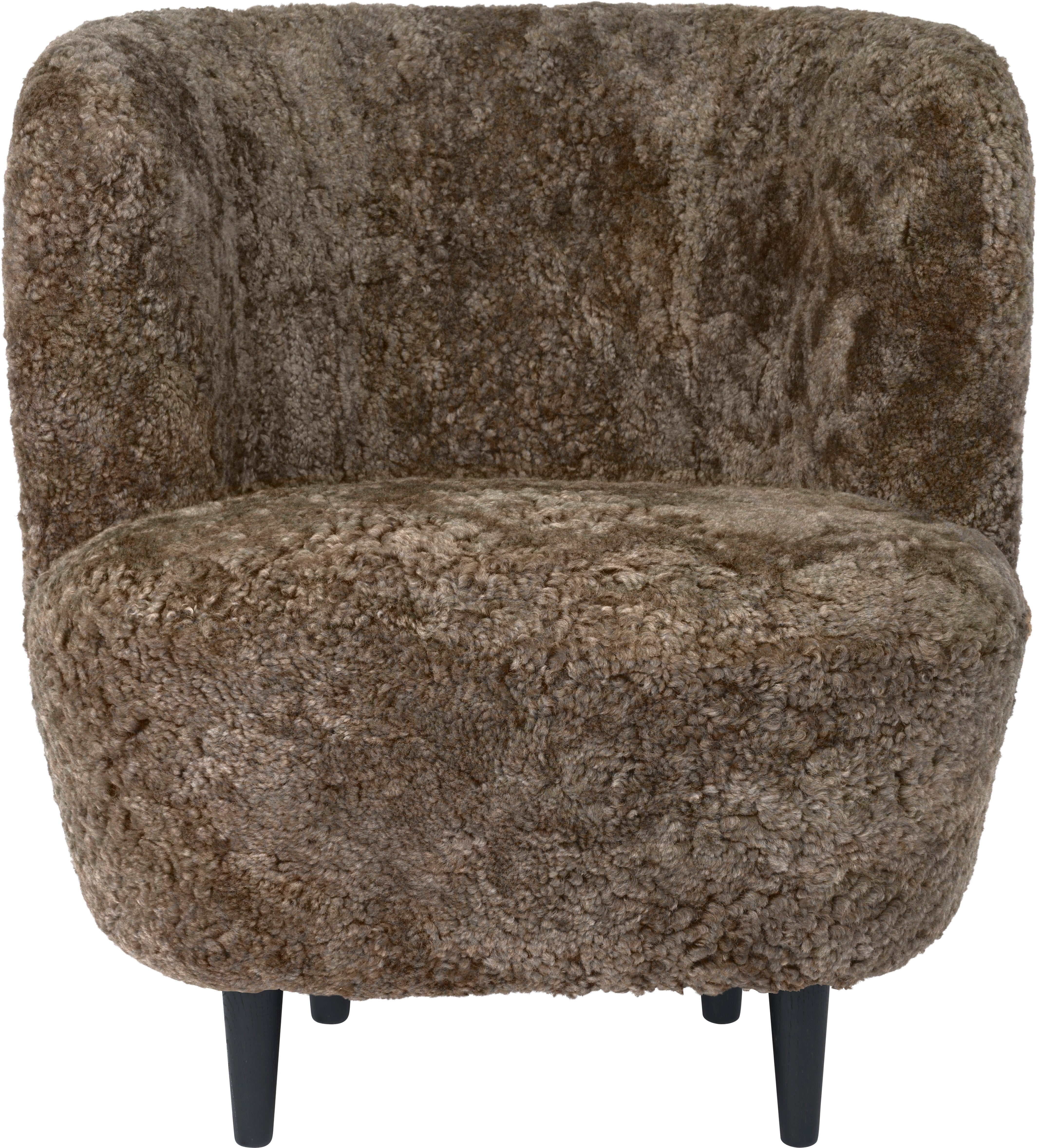 STAY upholstered armchair with a black oak base