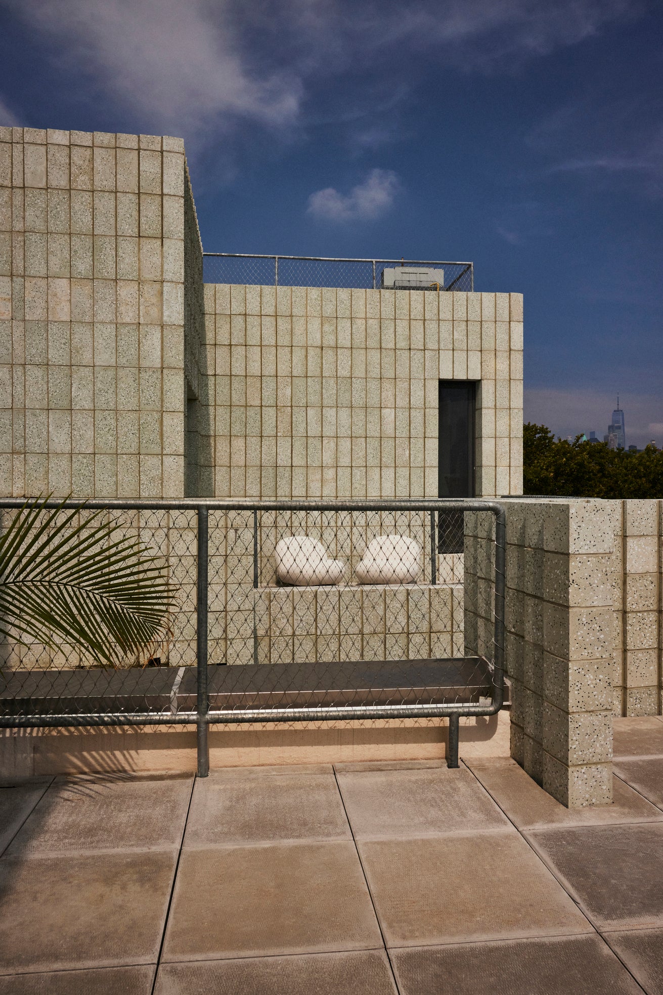 PACHA upholstered outdoor armchair with a gold base