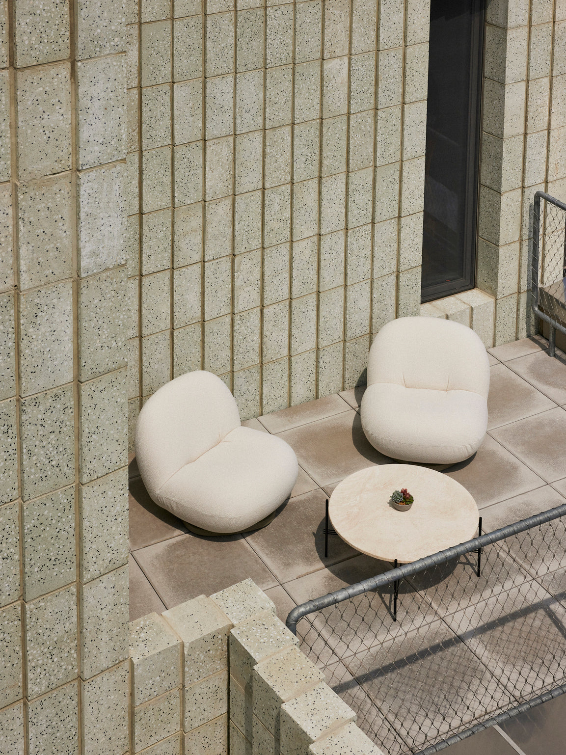 PACHA upholstered outdoor armchair with a gold base