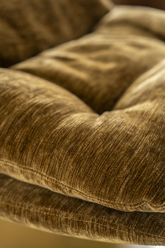 TROMBA mustard swivel armchair