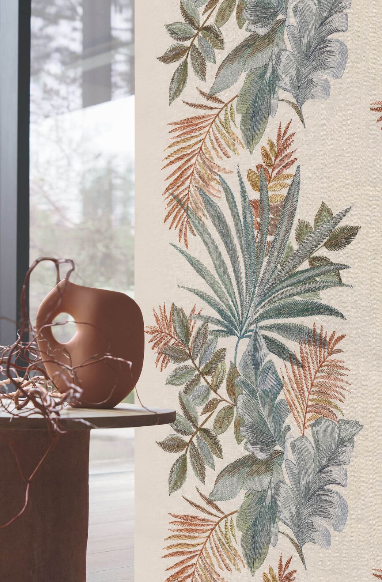 Textile wallpaper with a plant motif of leaves JARDIN EPHEMERE - EARTH OF SIENNA muted pink with green