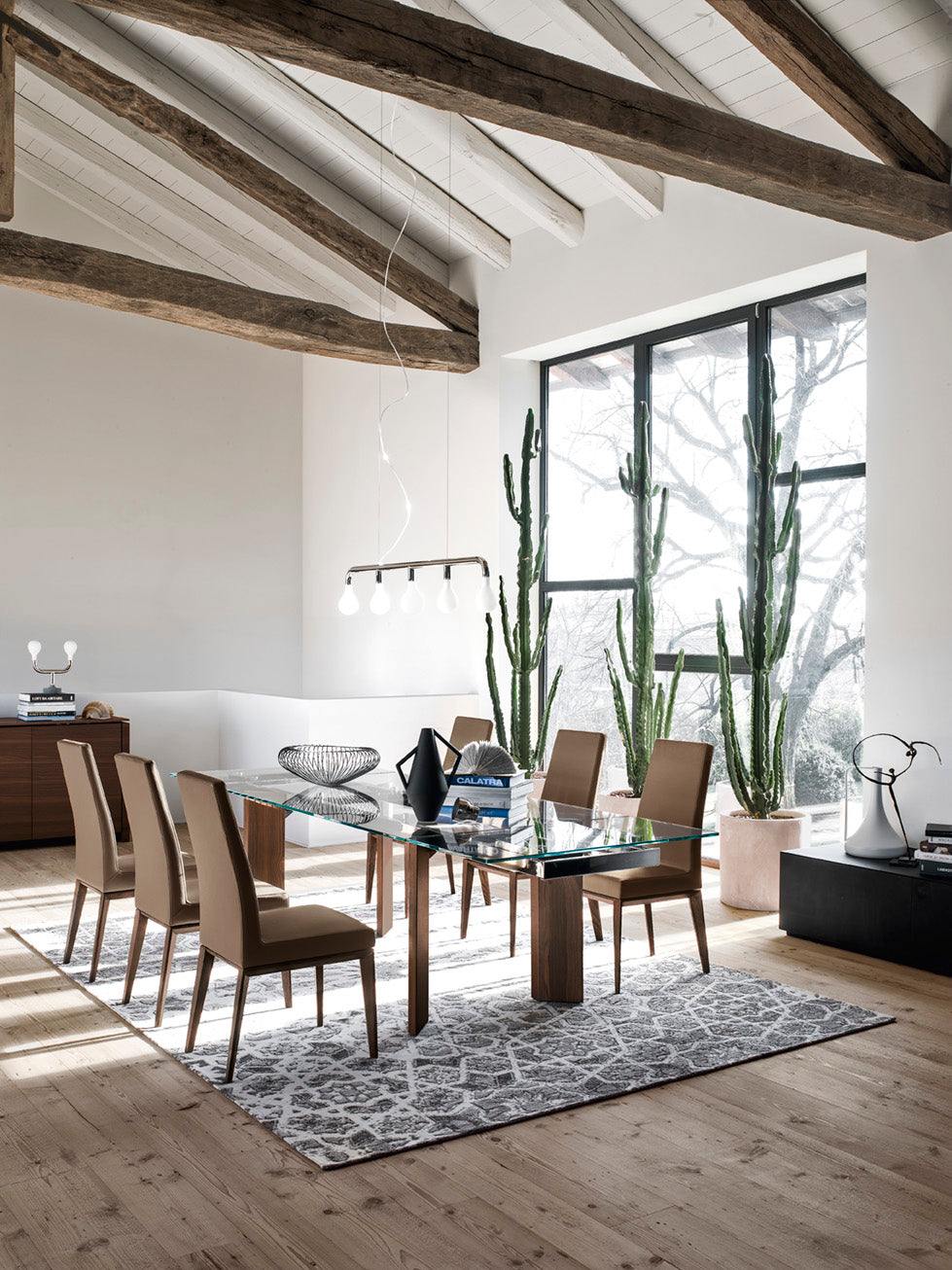 BESS upholstered chair with a dark wooden base