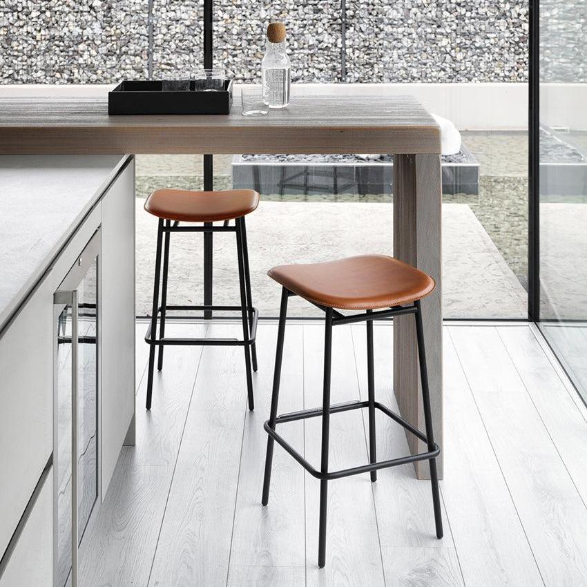 FIFTIES upholstered bar stool with a black base