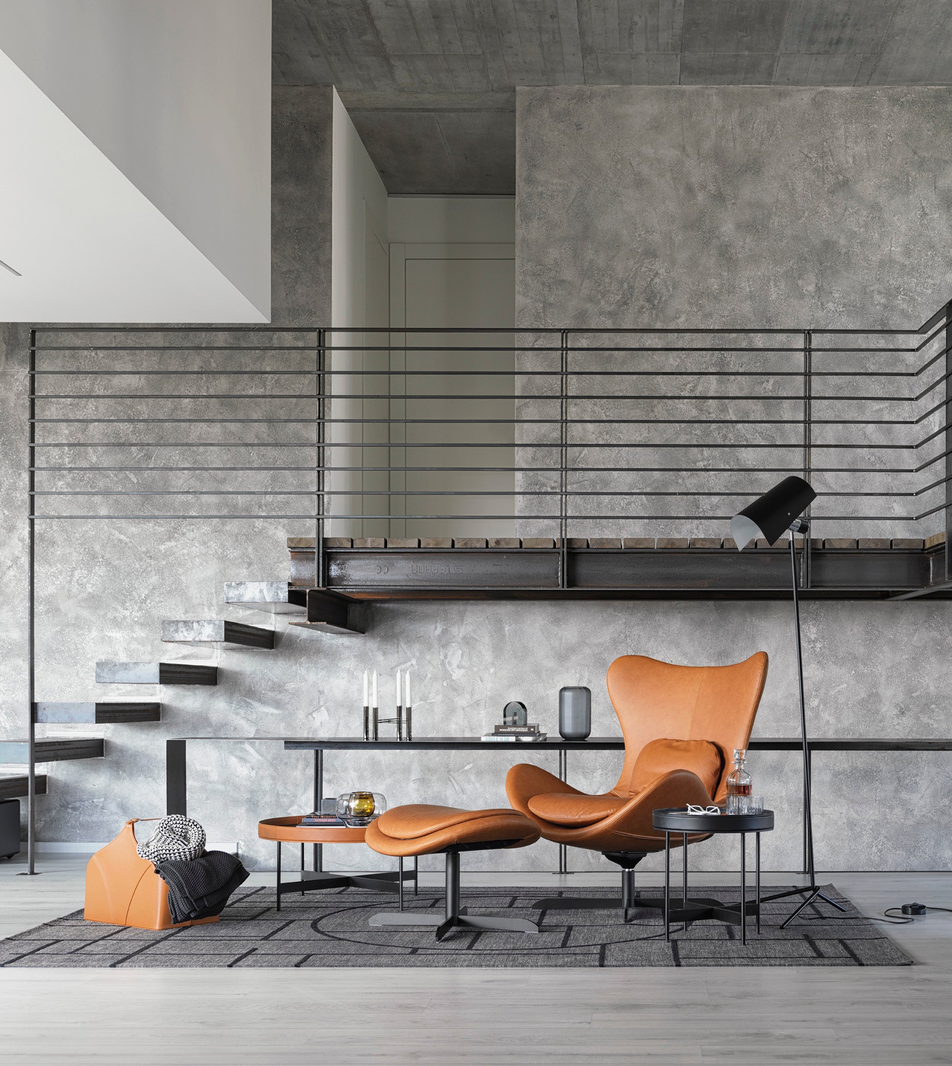 Gestoffeerde voetensteun LAZY met zwarte metalen basis