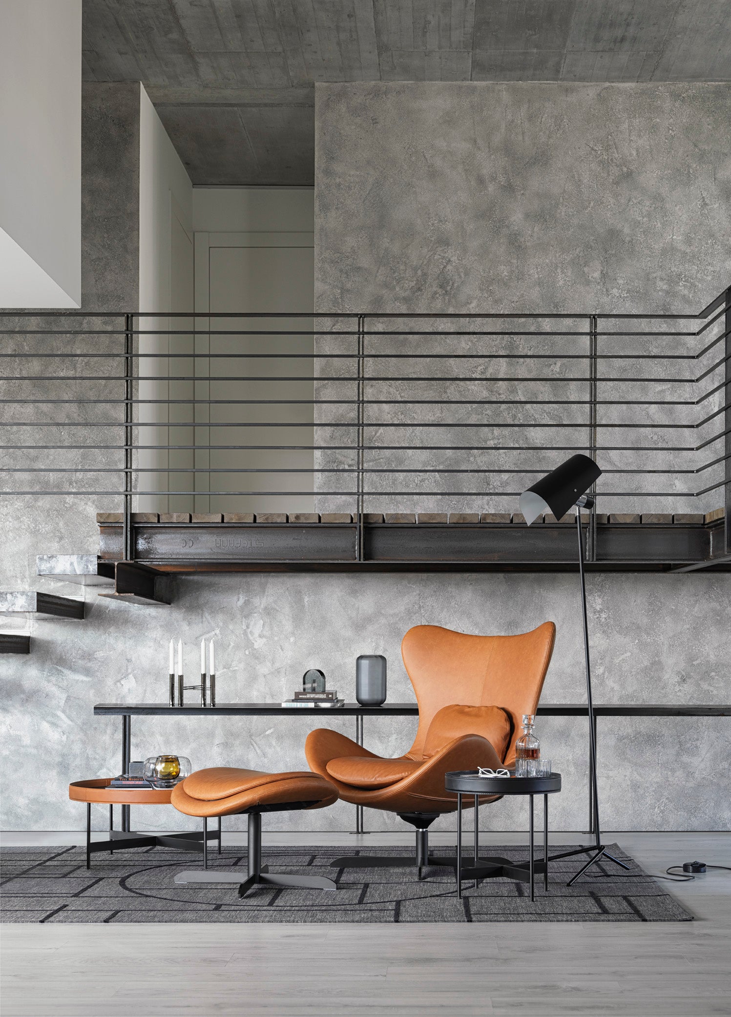 Gestoffeerde voetensteun LAZY met zwarte metalen basis